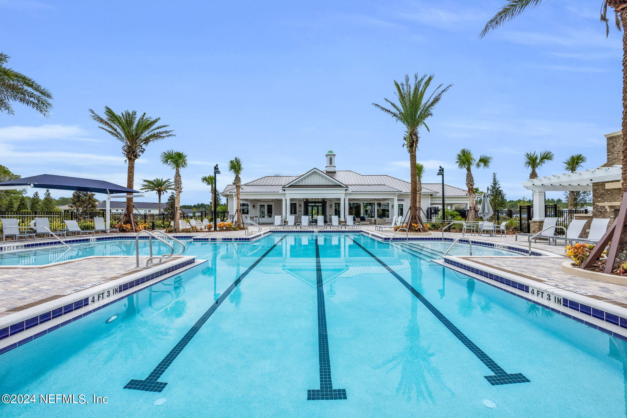 307 Fairlake Circle St. Augustine, FL 32092 - Photo 28 of 38 a view of a swimming pool with outdoor seating