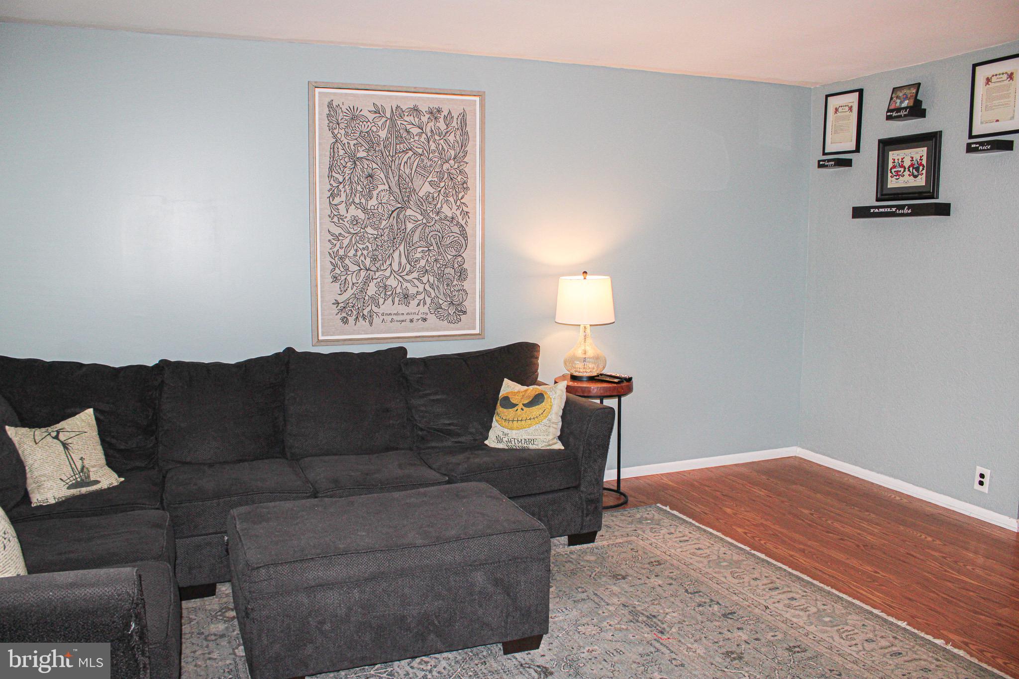 10830 Perrin Road Philadelphia, PA 19154 - Photo 4 of 24 a living room with furniture and a window