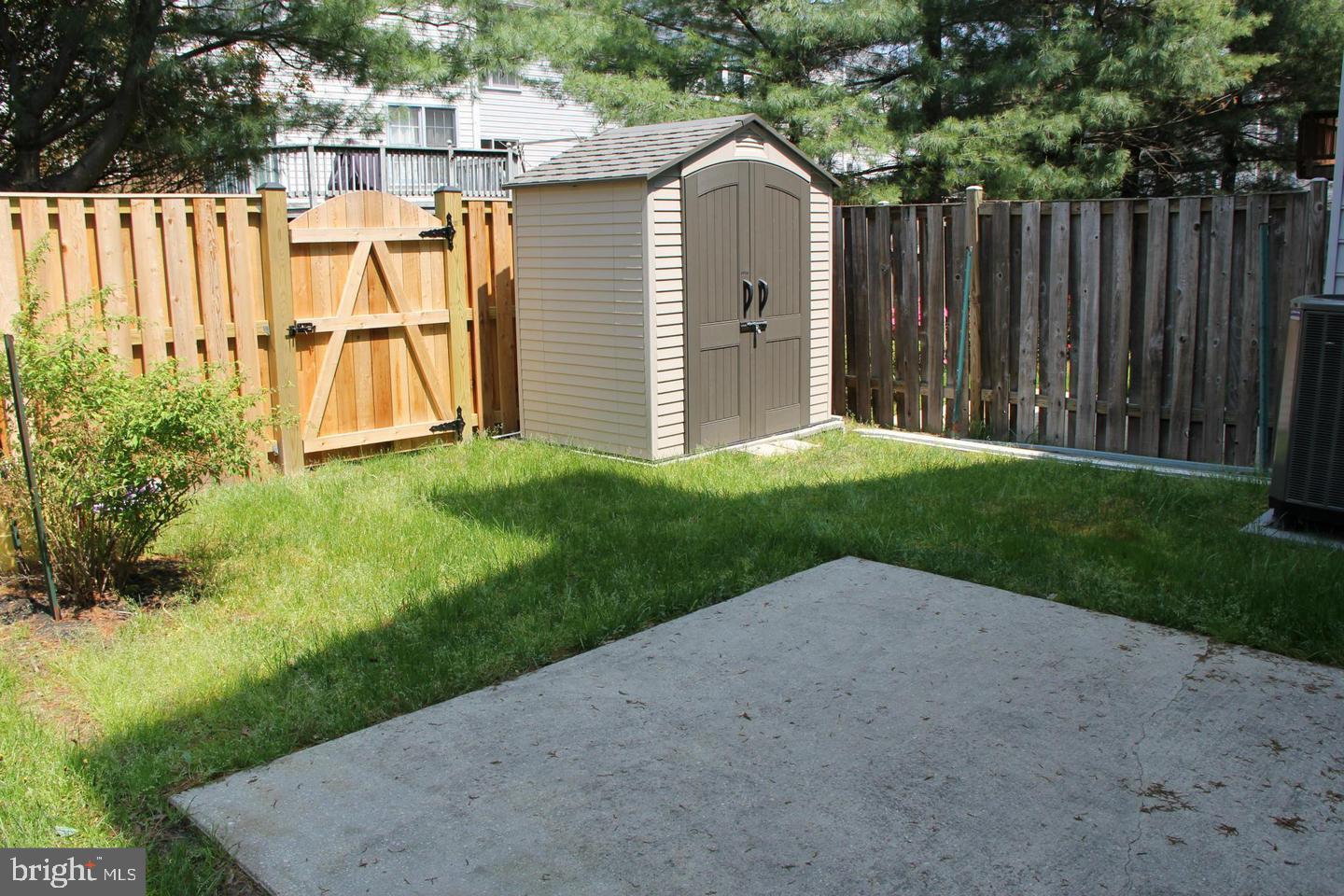 2148 Colonel Way Odenton, MD 21113 - Photo 19 of 20 Fenced in backyard with patio & shed