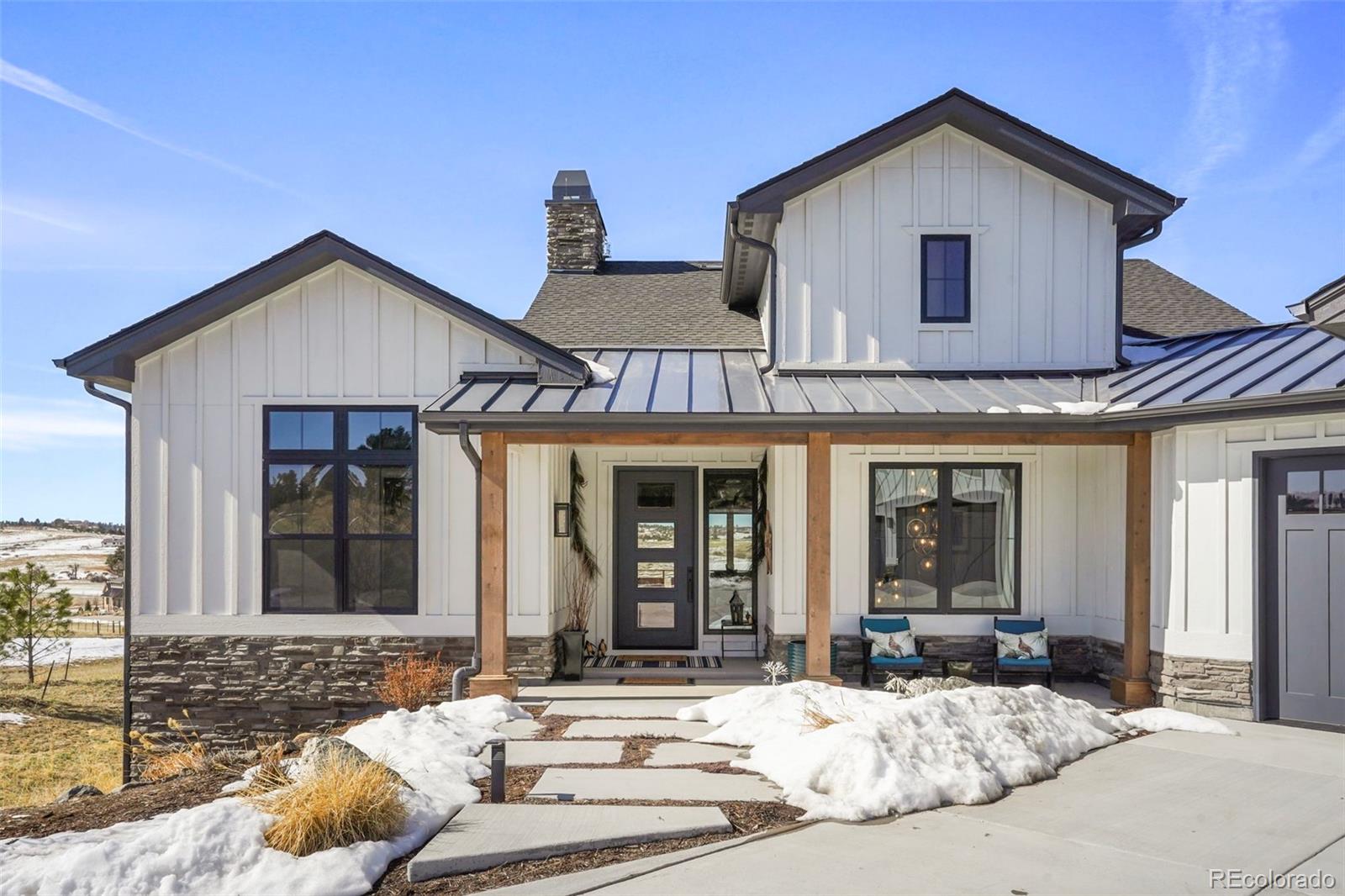 10621 Lone Fox Road Franktown, CO 80116 - Photo 2 of 50 a view of a house with a yard outdoor seating and yard