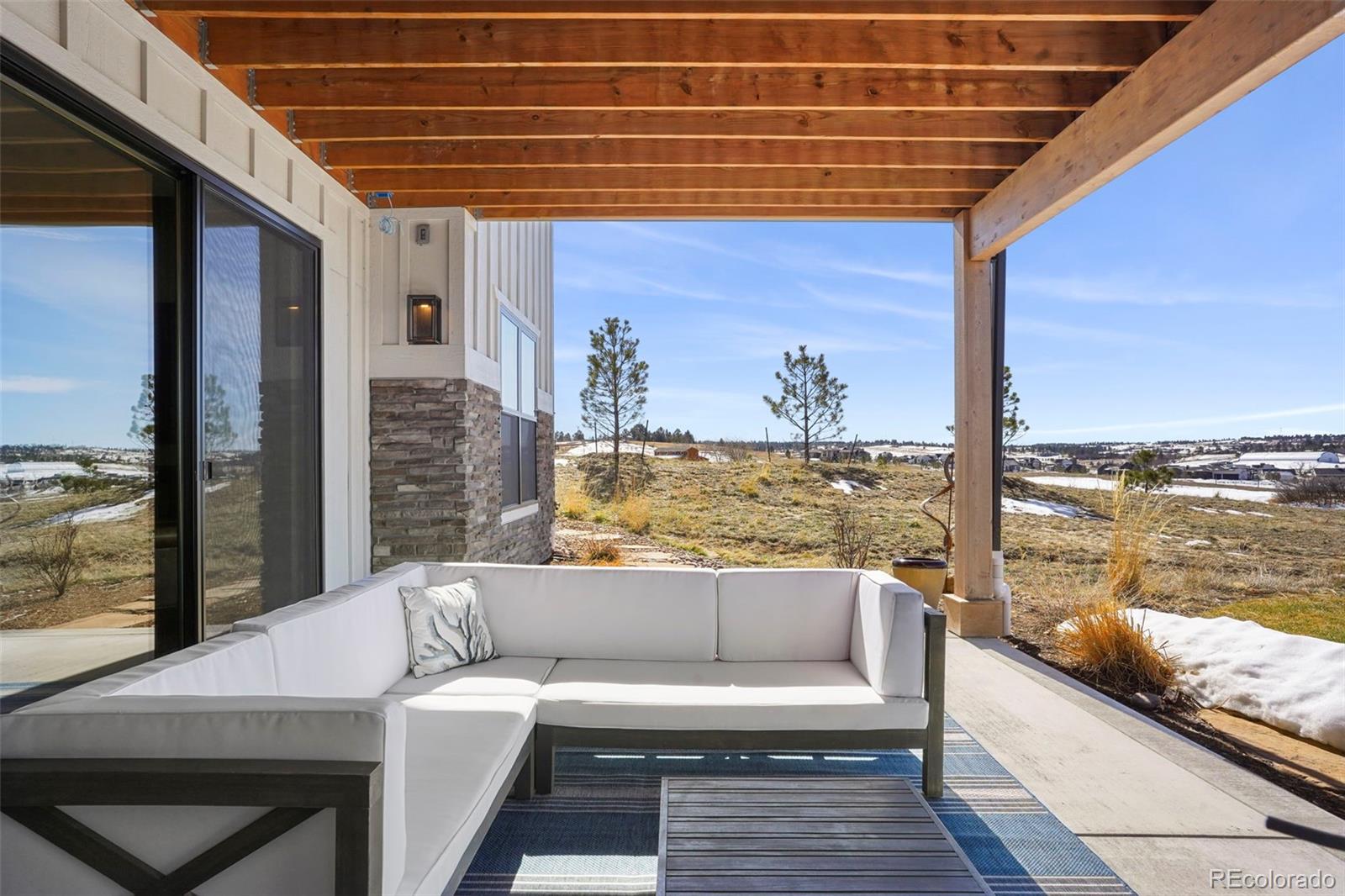 10621 Lone Fox Road Franktown, CO 80116 - Photo 43 of 50 a outdoor space with patio