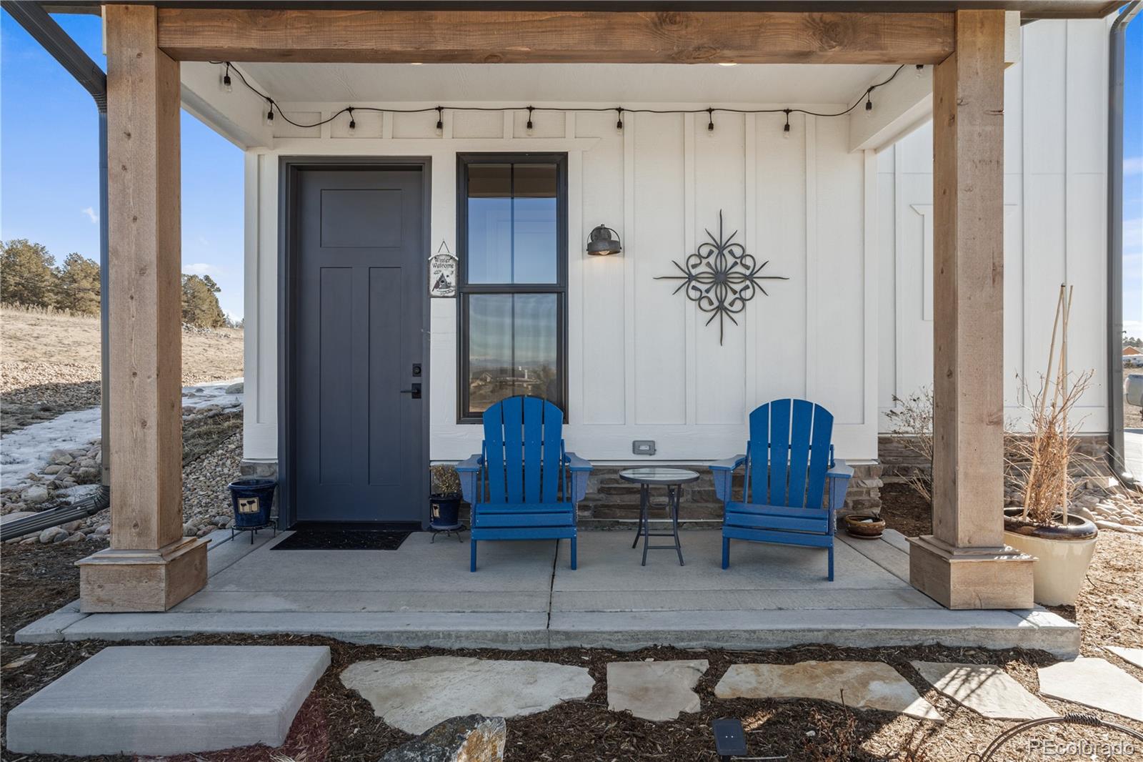 10621 Lone Fox Road Franktown, CO 80116 - Photo 46 of 50 a living room with furniture