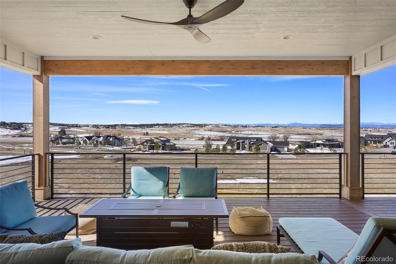 10621 Lone Fox Road Franktown, CO 80116 - Photo 10 of 50 a view of a terrace with sky view
