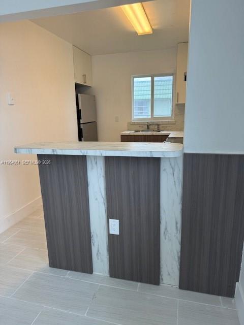 800 Northwest 44th Avenue, Unit 4 Miami, FL 33126 - Photo 7 of 16 a bathroom with a sink and a mirror