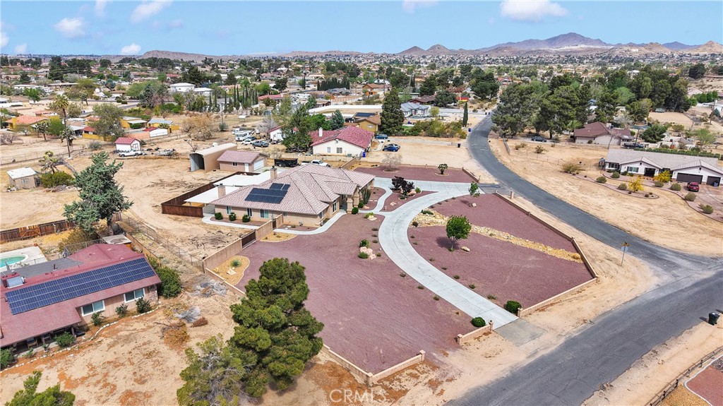 19501 Kinai Road Apple Valley, CA 92307 - Photo 65 of 69 an aerial view of a house with a ocean view