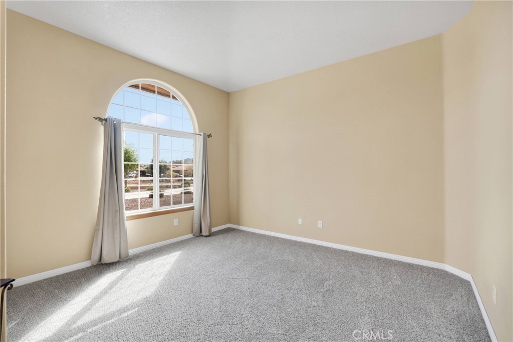 19501 Kinai Road Apple Valley, CA 92307 - Photo 9 of 69 an empty room with windows