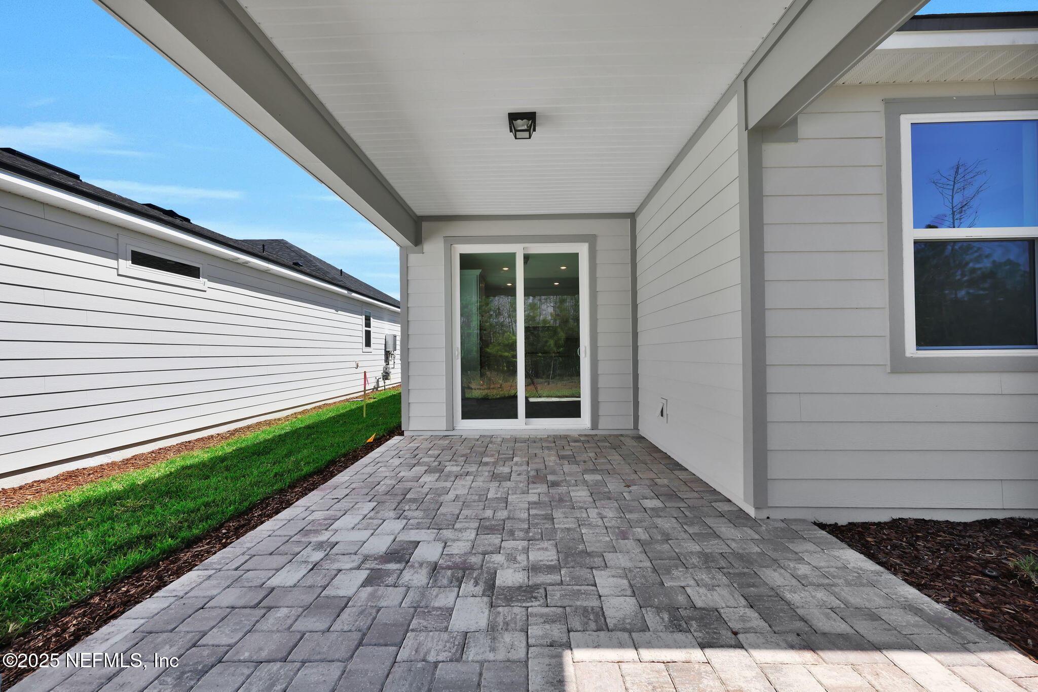 186 Coordinate Lane St. Johns, FL 32259 - Photo 15 of 18 Highgate Extended Covered Lanai