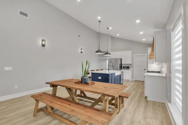 a kitchen with a sink and stove