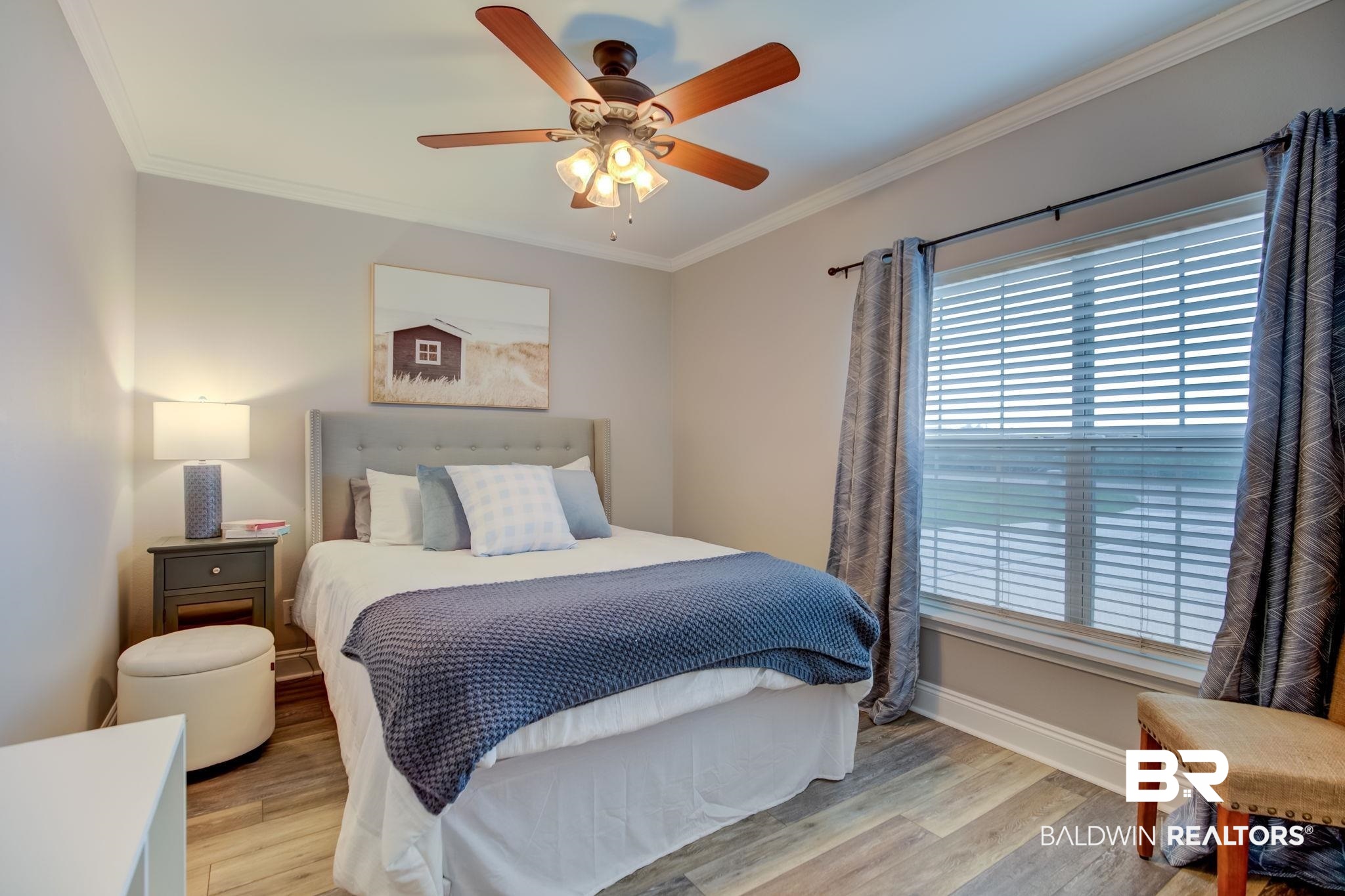 18732 Fairground Road Robertsdale, AL 36567 - Photo 31 of 46 Bedroom featuring light hardwood / wood-style floors, ceiling fan, and crown molding
