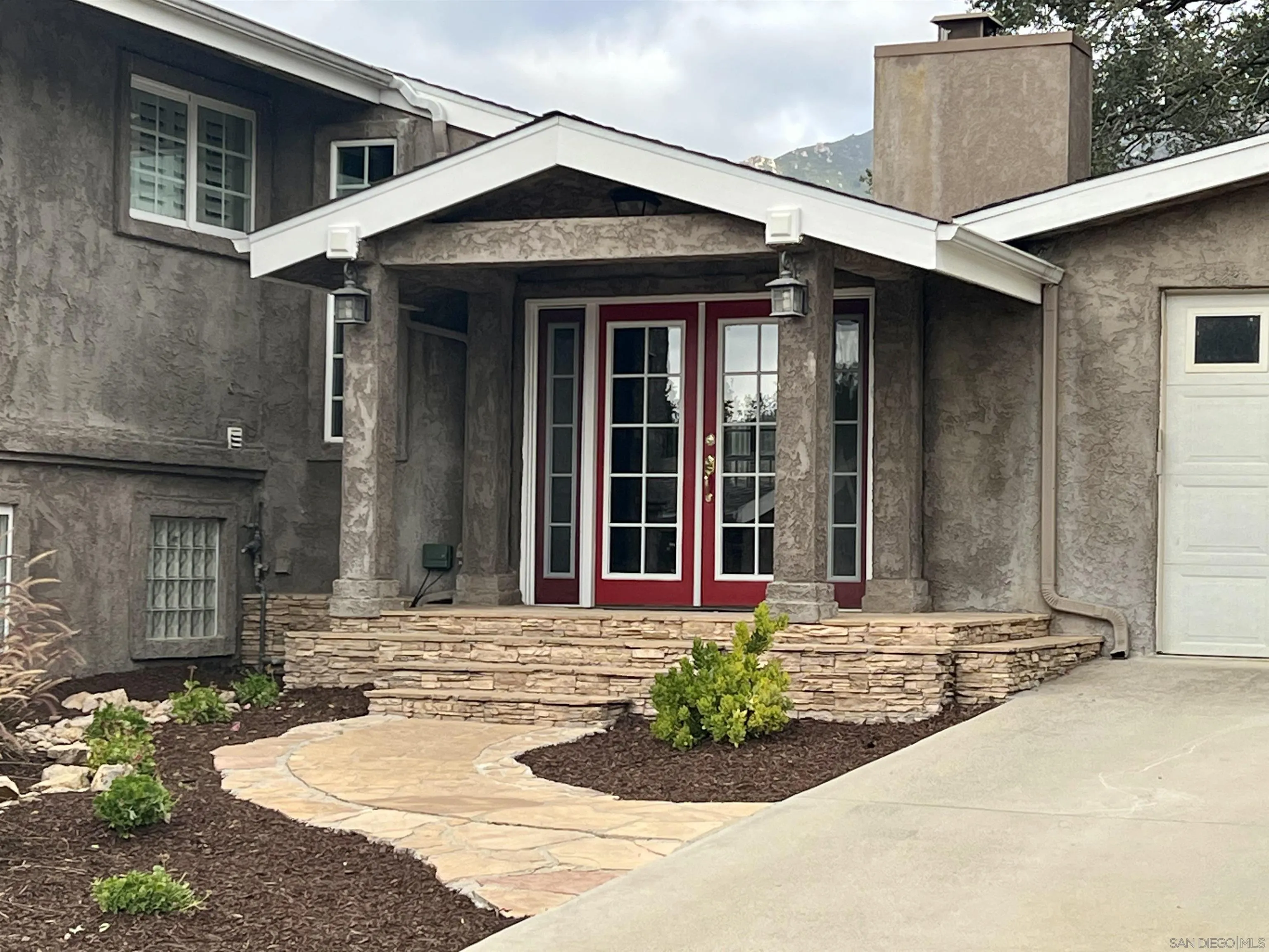 40158 De Luz Road Fallbrook, CA 92028 - Photo 35 of 40 a front view of a house with a yard