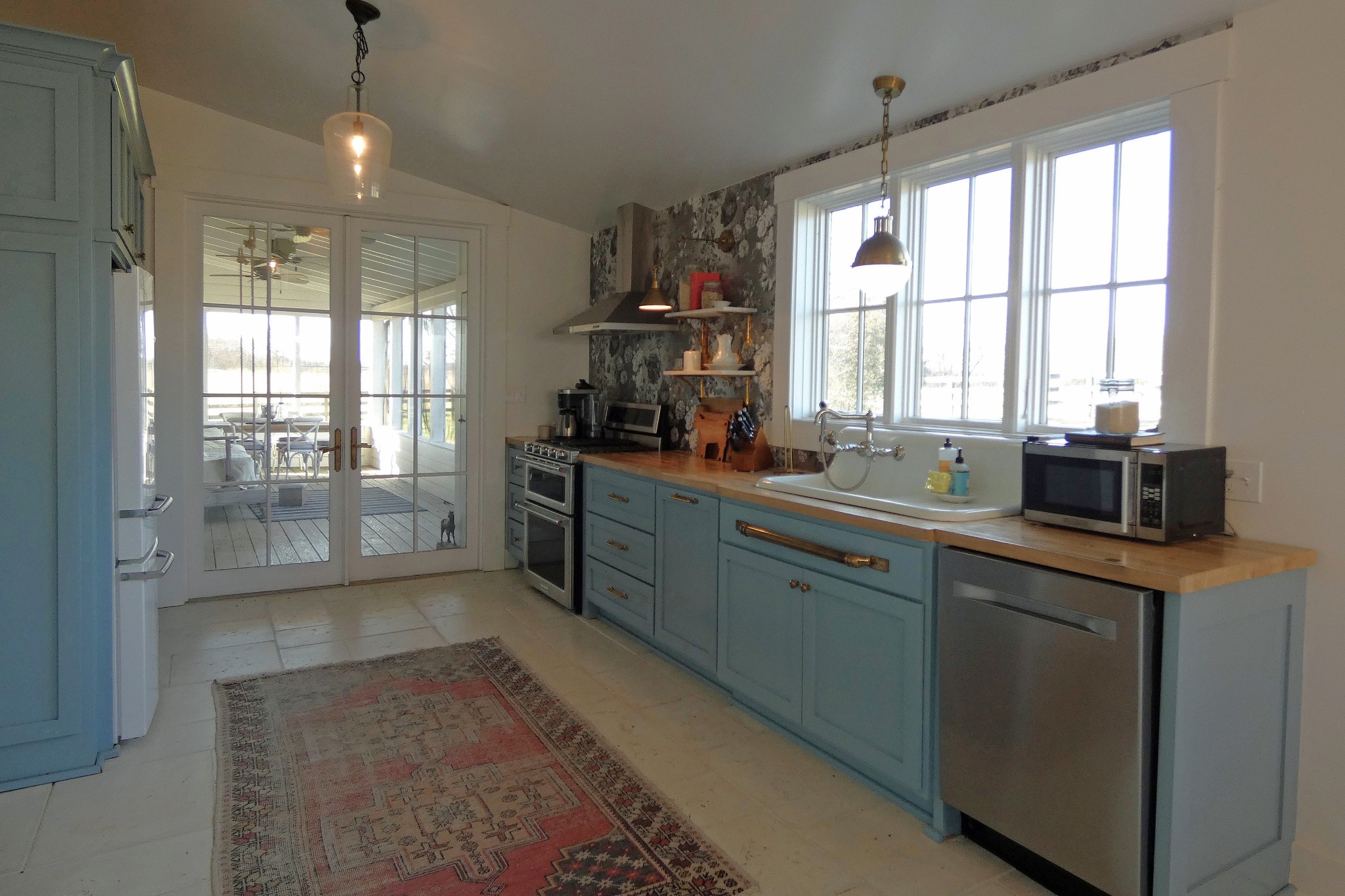 2060 Luther Herald Road Franklin, KY 42134 - Photo 8 of 58 a kitchen with stainless steel appliances granite countertop sink window and cabinets