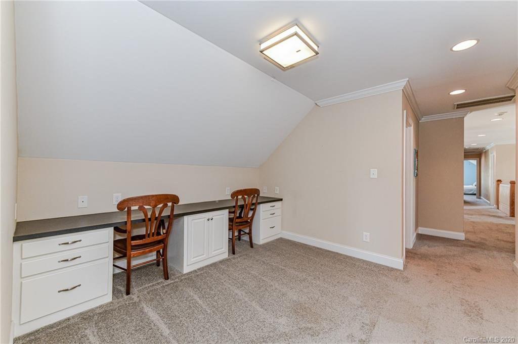150 North Moose Road Mount Pleasant, NC 28124 - Photo 21 of 32 an empty room with furniture and natural light