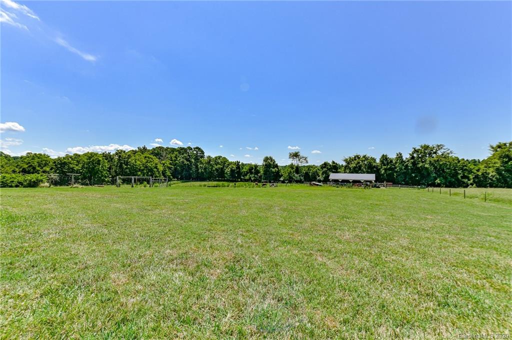 150 North Moose Road Mount Pleasant, NC 28124 - Photo 29 of 32 a view of field with trees in the background