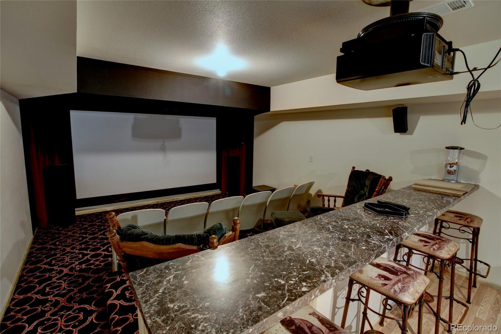 530 Red Feather Road Cotopaxi, CO 81223 - Photo 32 of 46 a living room with furniture and a flat screen tv