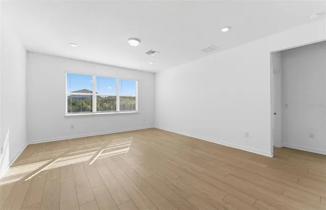 a view of kitchen with wooden floor