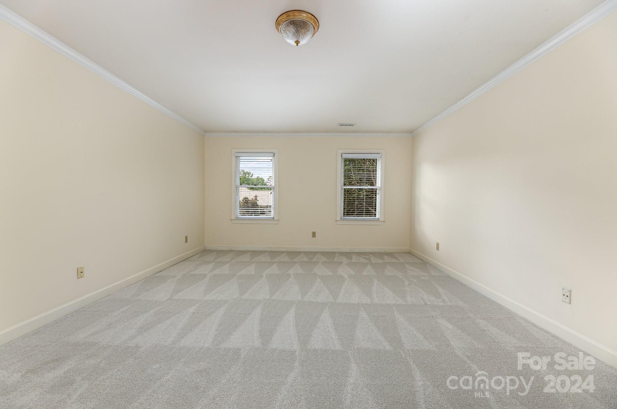 127 Polo Drive Salisbury, NC 28144 - Photo 16 of 31 an empty room with windows