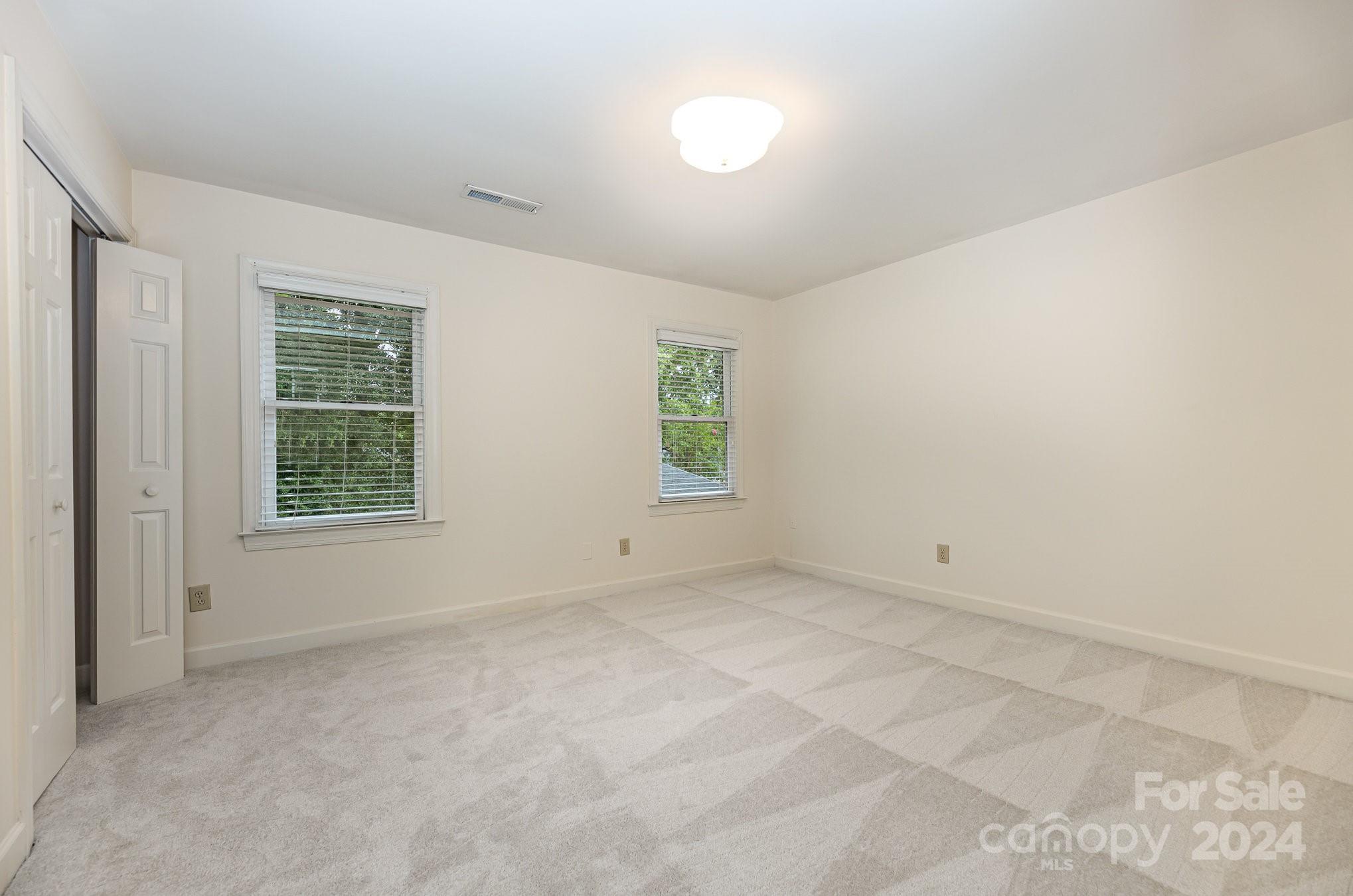 127 Polo Drive Salisbury, NC 28144 - Photo 18 of 31 an empty room with windows