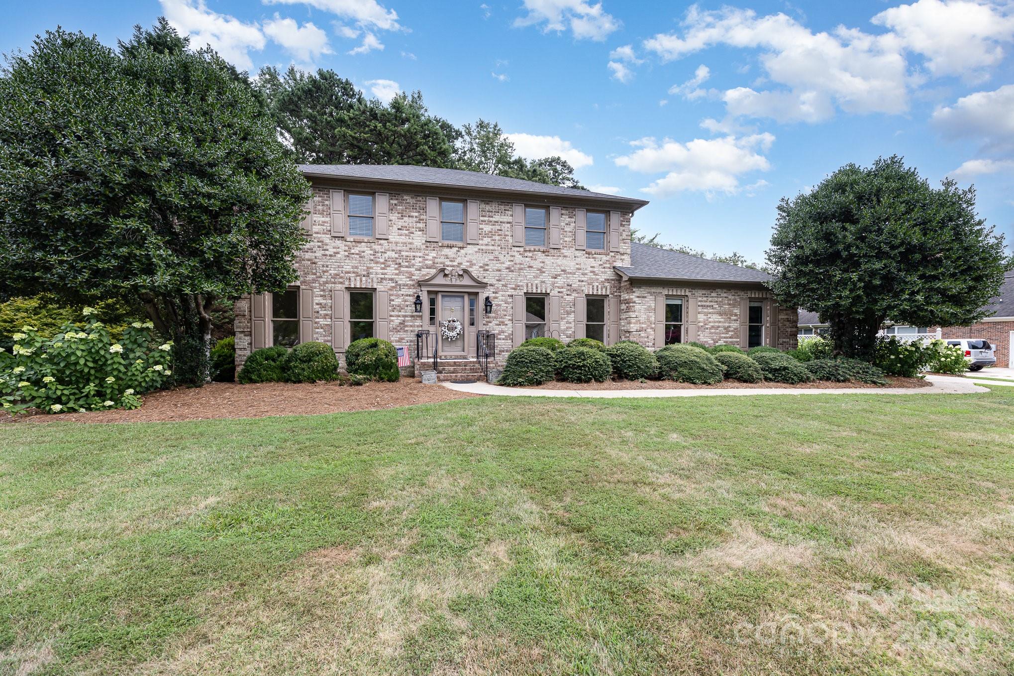 127 Polo Drive Salisbury, NC 28144 - Photo 2 of 31 a front view of house with yard and green space