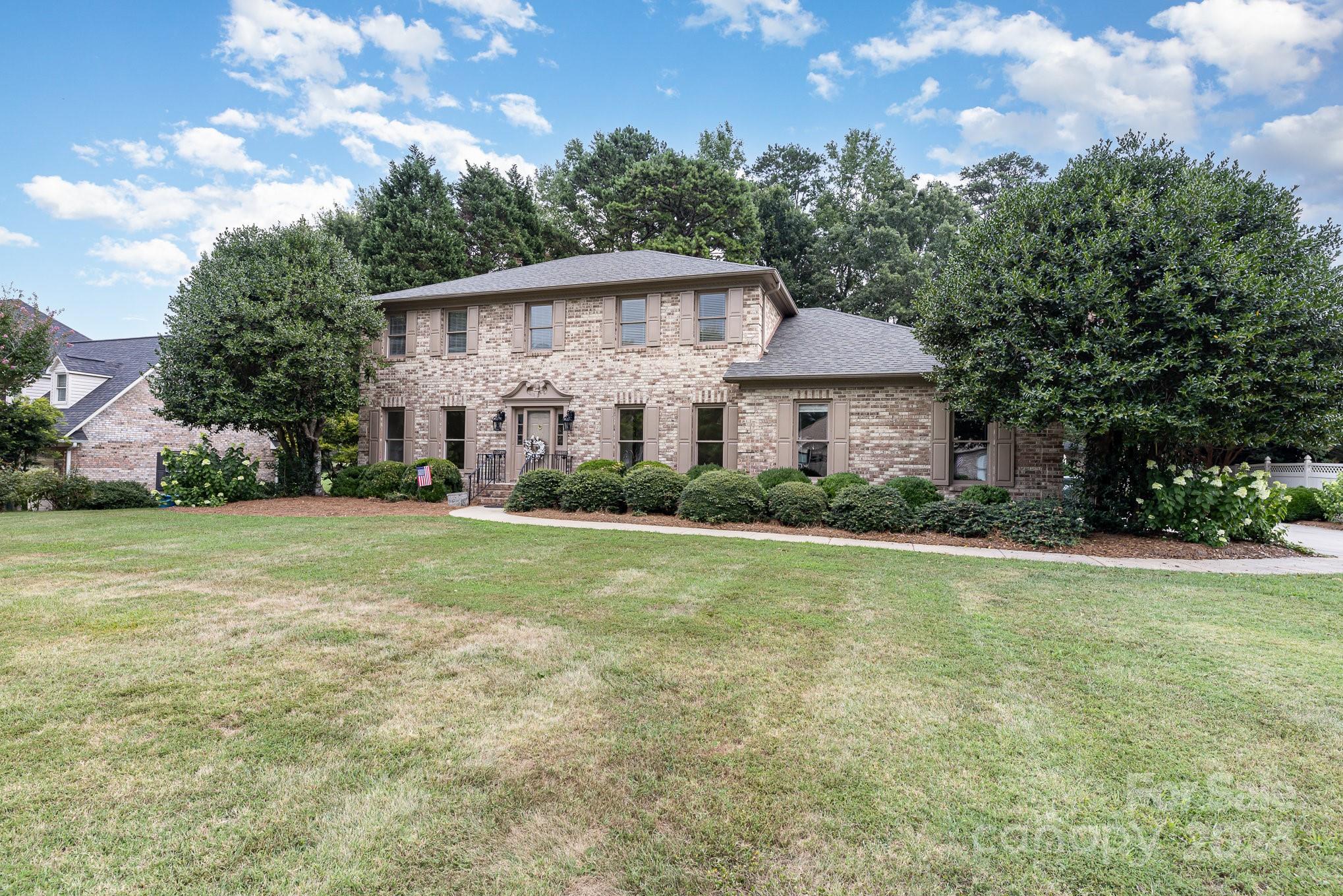 127 Polo Drive Salisbury, NC 28144 - Photo 26 of 31 a front view of a house with a yard