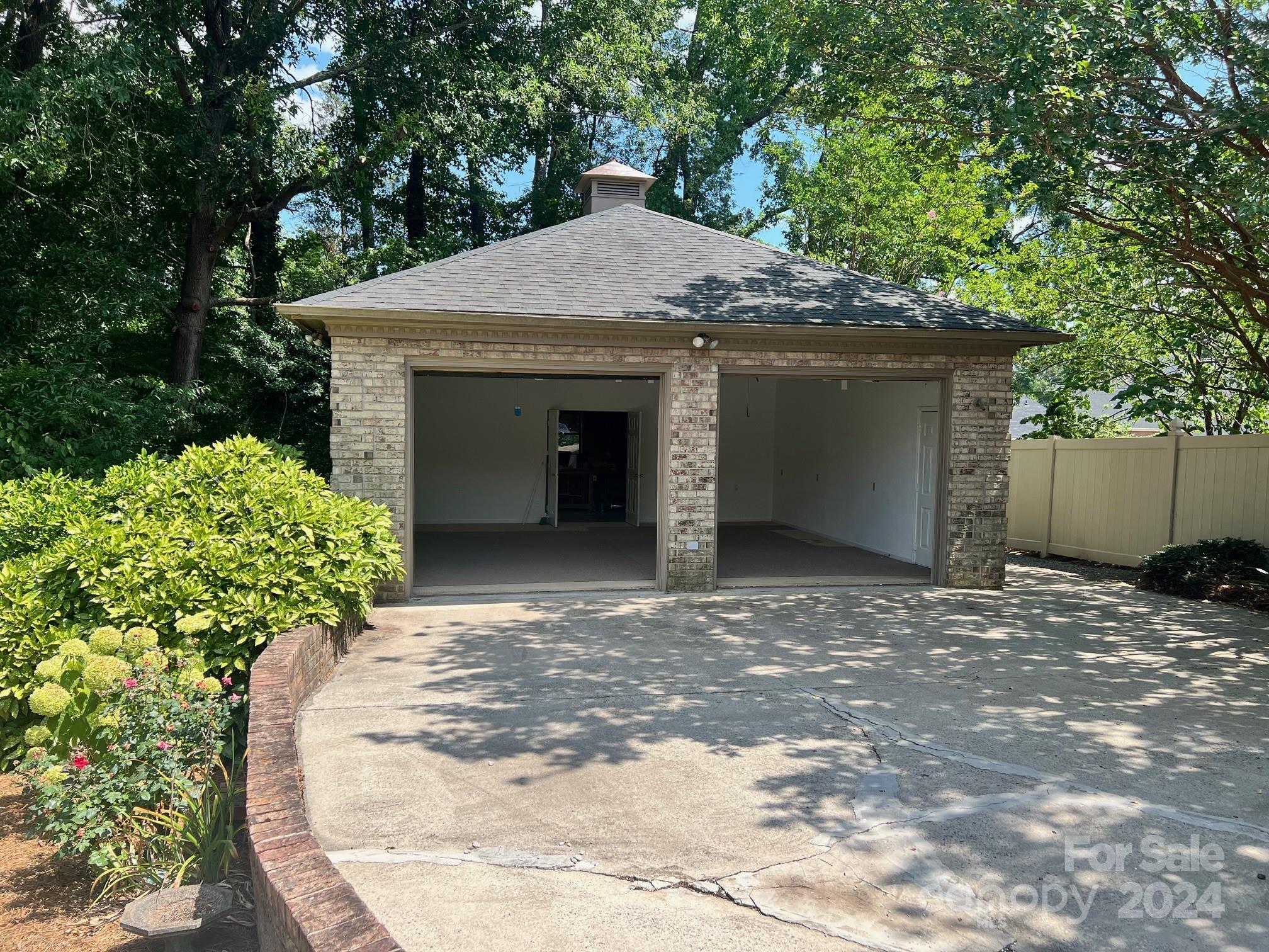127 Polo Drive Salisbury, NC 28144 - Photo 30 of 31 a view of a house with a small yard and a large tree