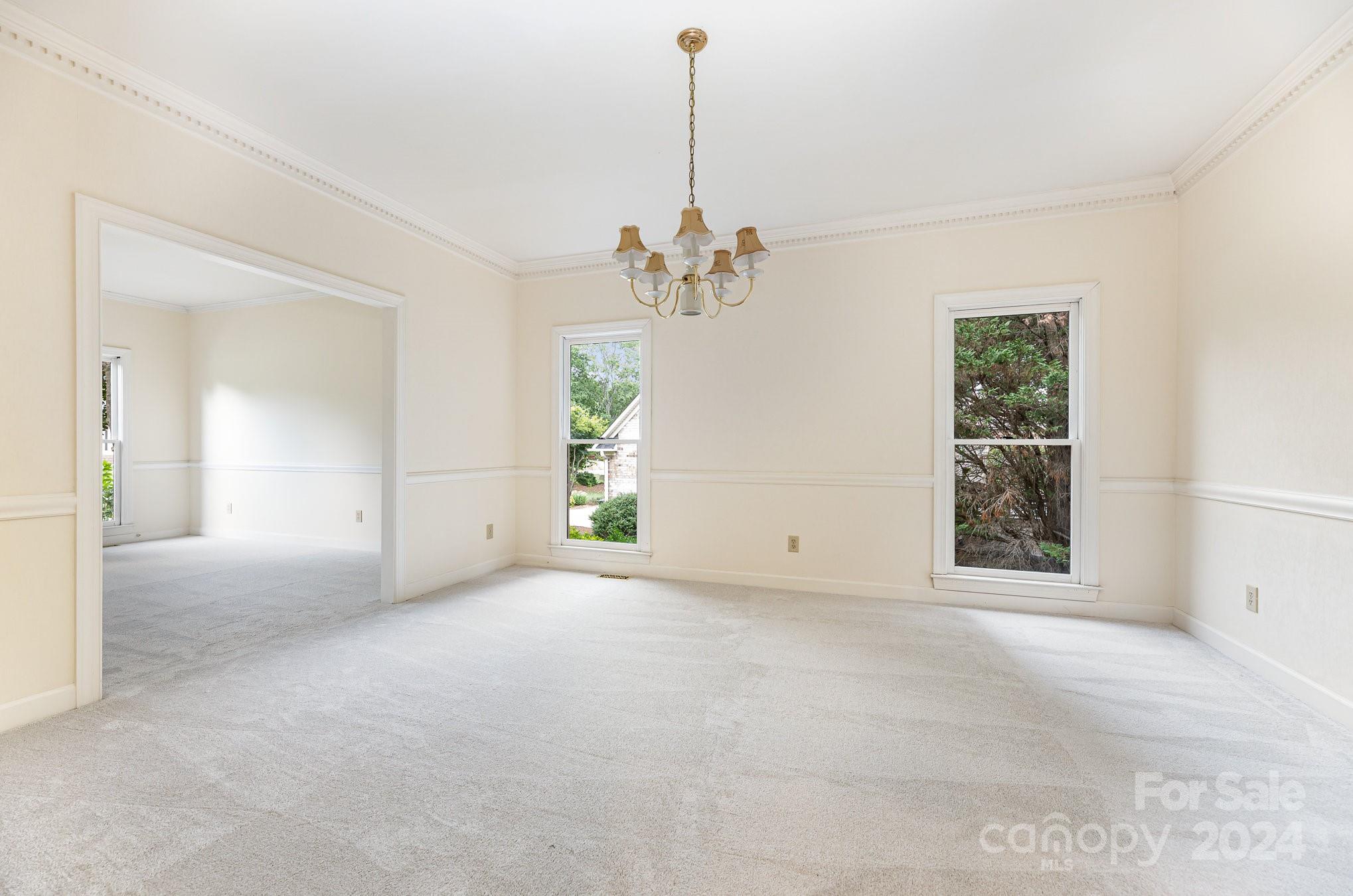 127 Polo Drive Salisbury, NC 28144 - Photo 6 of 31 an empty room with windows and entrance