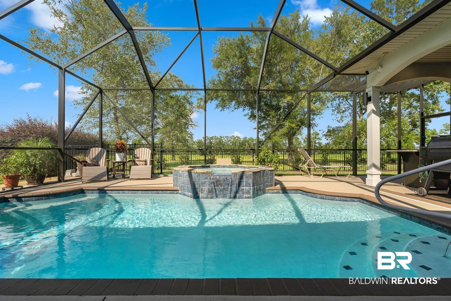 23357 Carnoustie Drive Foley, AL 36535 - Photo 28 of 99 View of pool featuring a lanai, a patio, and a pool with connected hot tub