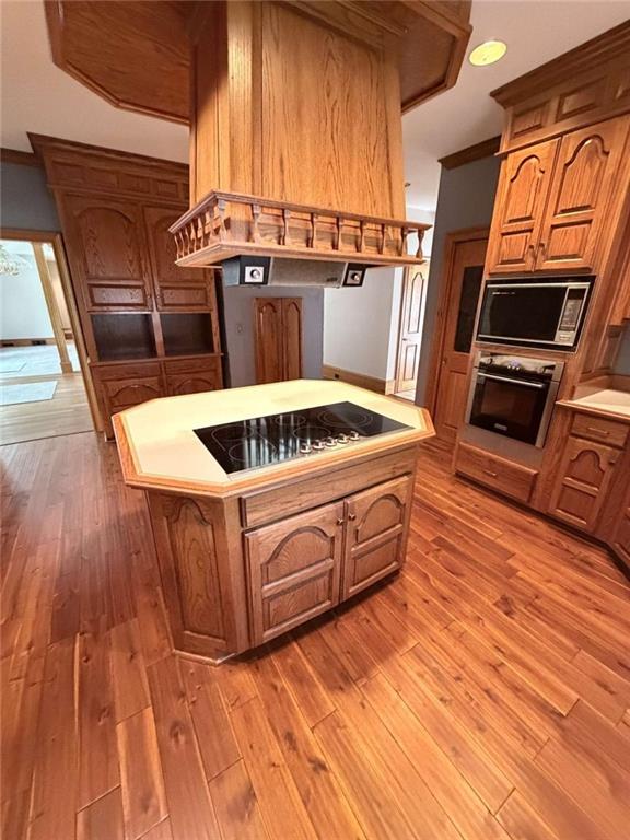 763 McDaniel Mill Road Southwest Conyers, GA 30094 - Photo 30 of 80 a kitchen with stainless steel appliances granite countertop a stove a sink and a microwave