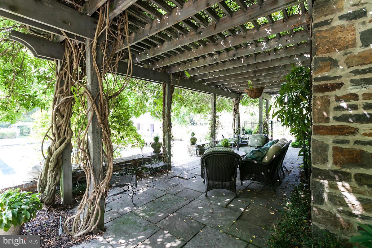 7900 Ruxwood Road Baltimore, MD 21204 - Photo 21 of 30 Wisteria Pergola & Patio