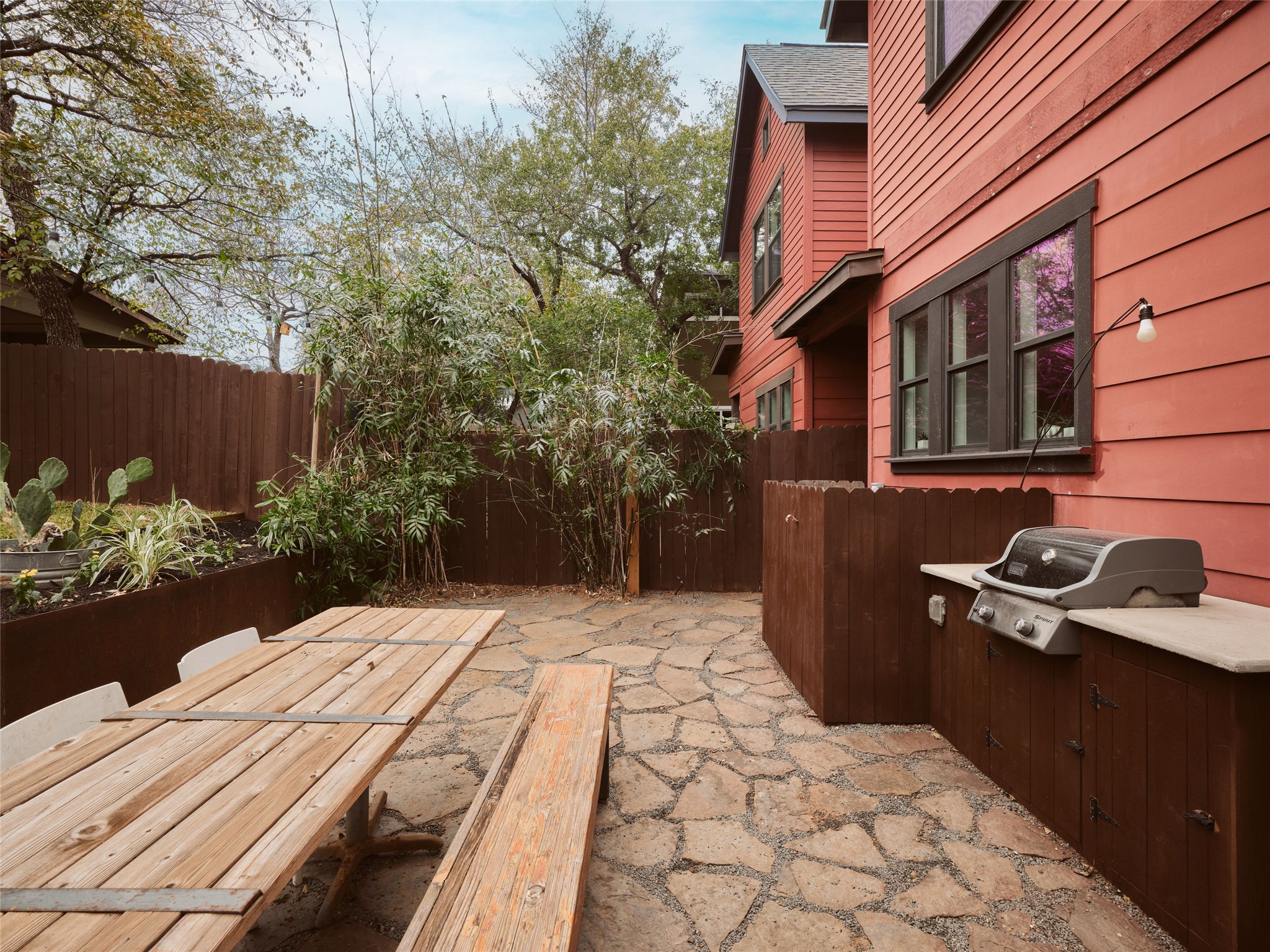 2002 East 13th Street, Unit A Austin, TX 78702 - Photo 30 of 37 View of patio / terrace featuring a grill and outdoor dining space
