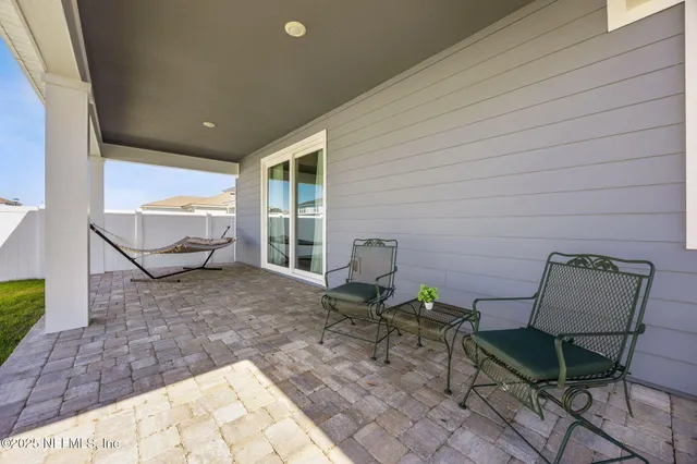 a view of a lake with a yard