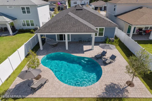 a view of a deck with a yard