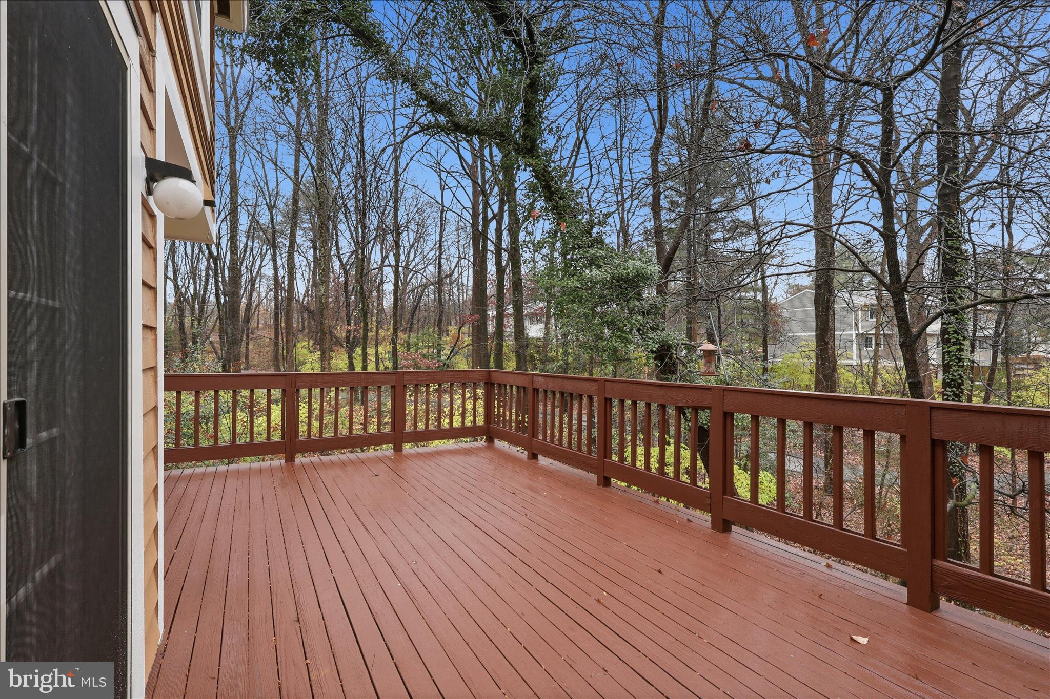 11725 Arbor Glen Way Reston, VA 20194 - Photo 15 of 63 a view of balcony with wooden floor