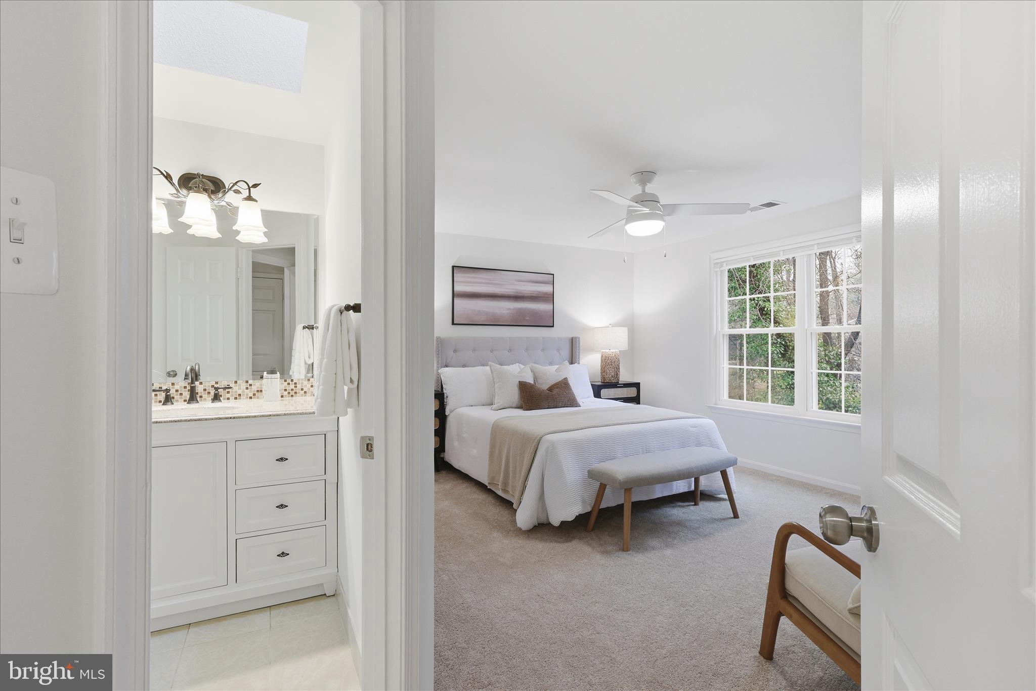 11725 Arbor Glen Way Reston, VA 20194 - Photo 19 of 63 a bed room with a bed and a window