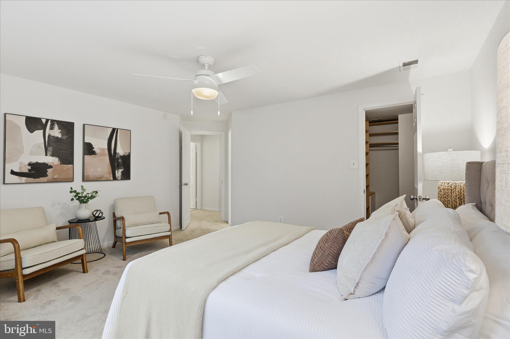 11725 Arbor Glen Way Reston, VA 20194 - Photo 21 of 63 a bedroom with a bed and wooden floor