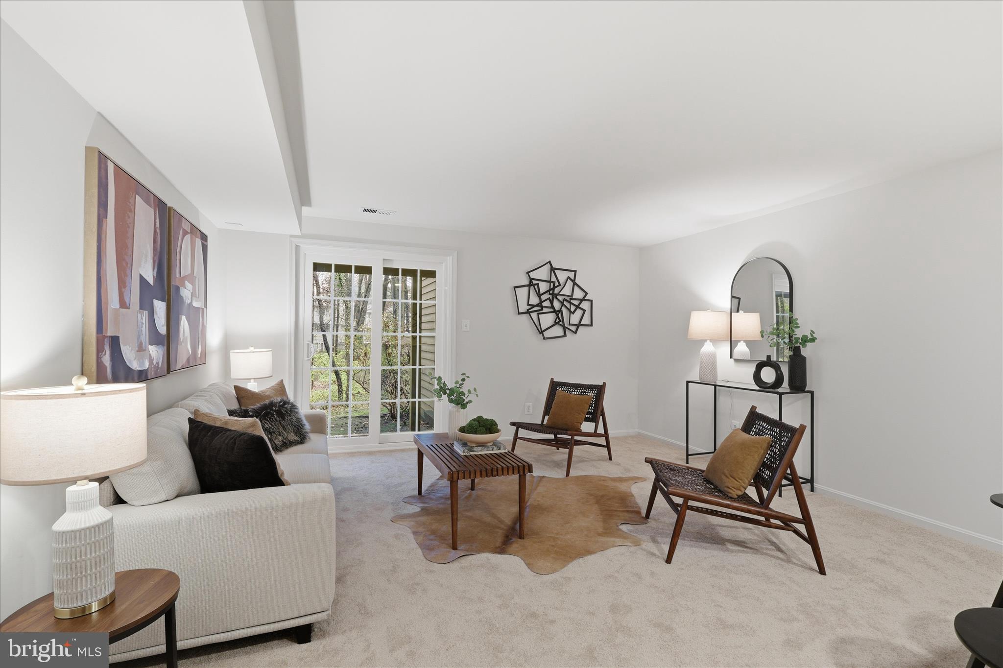 11725 Arbor Glen Way Reston, VA 20194 - Photo 30 of 63 a living room with furniture and a window