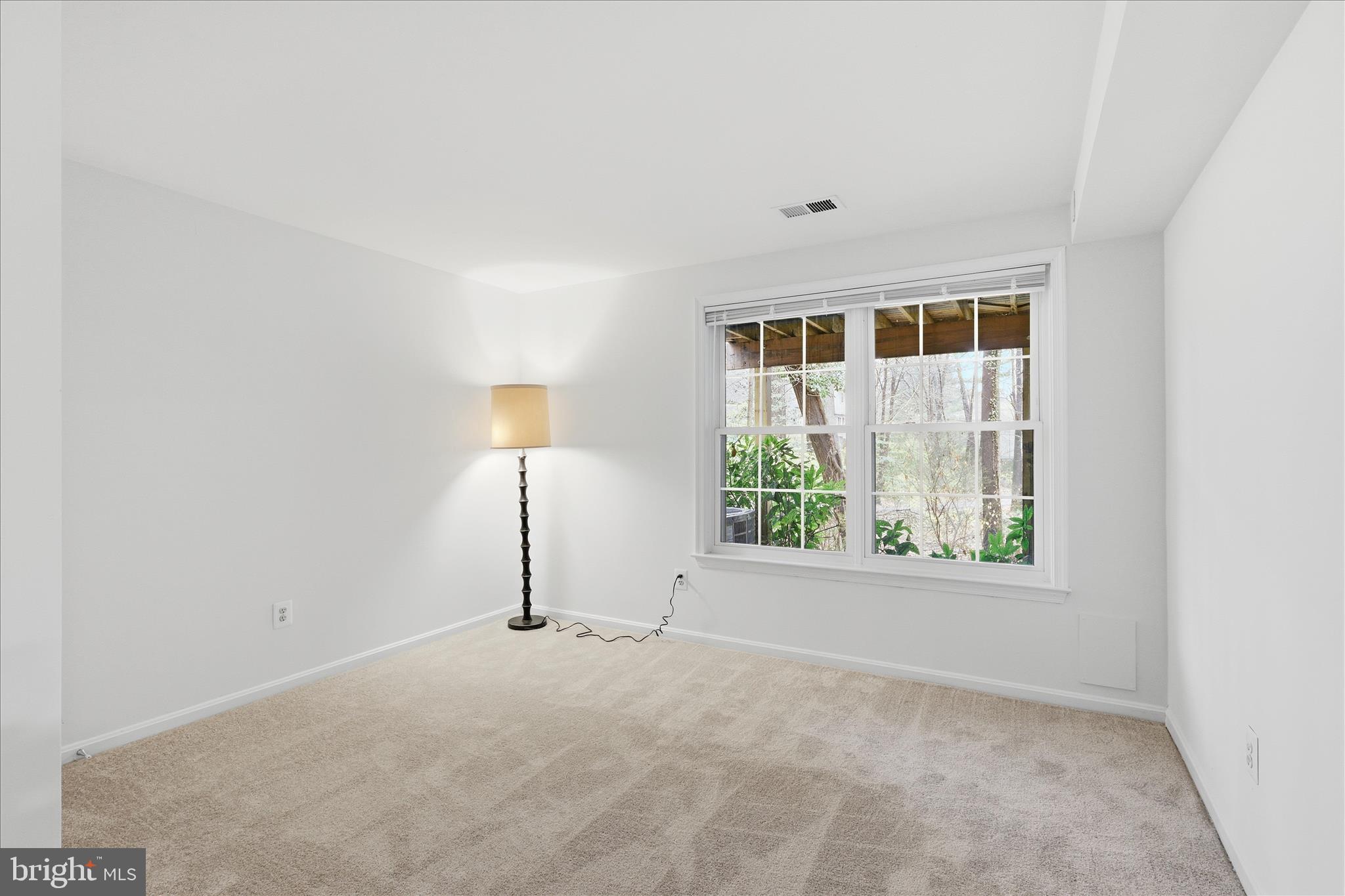 11725 Arbor Glen Way Reston, VA 20194 - Photo 33 of 63 an empty room with windows