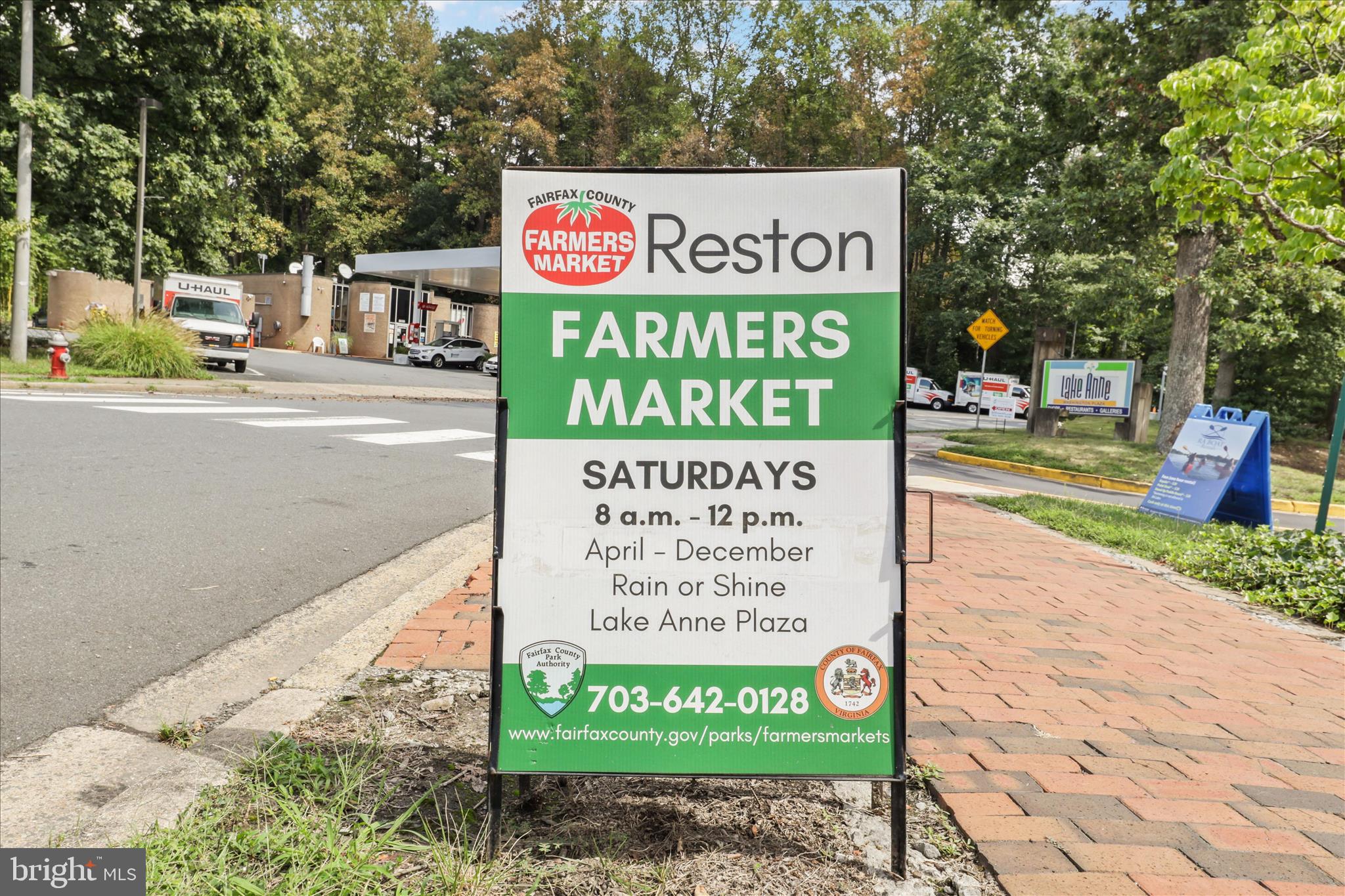11725 Arbor Glen Way Reston, VA 20194 - Photo 45 of 63 a sign on the side of a street
