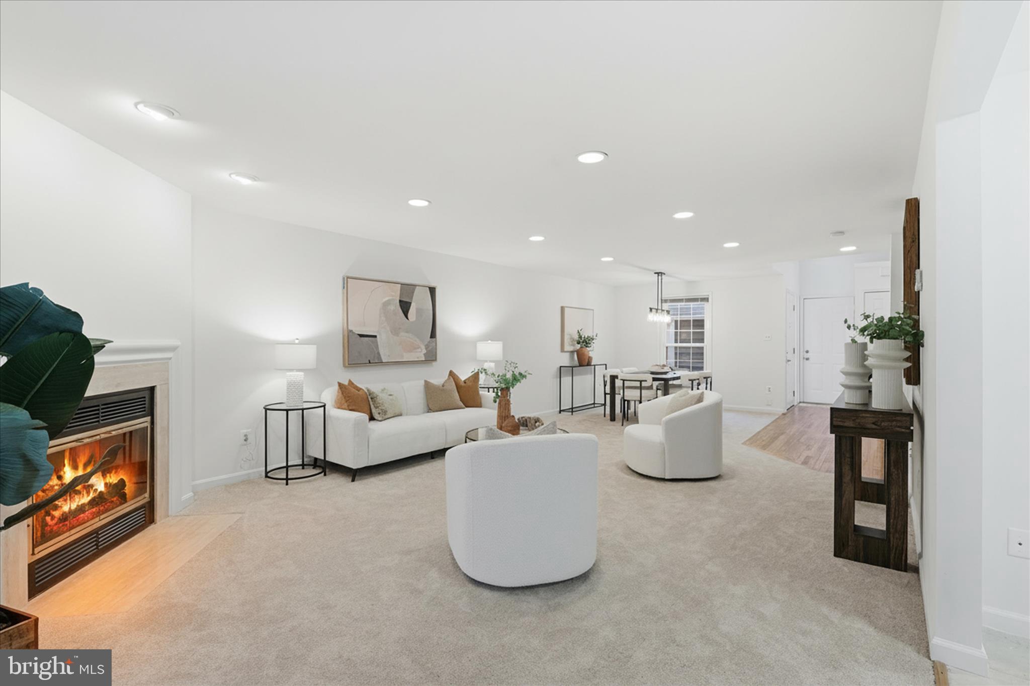 11725 Arbor Glen Way Reston, VA 20194 - Photo 7 of 63 a living room with furniture and a flat screen tv