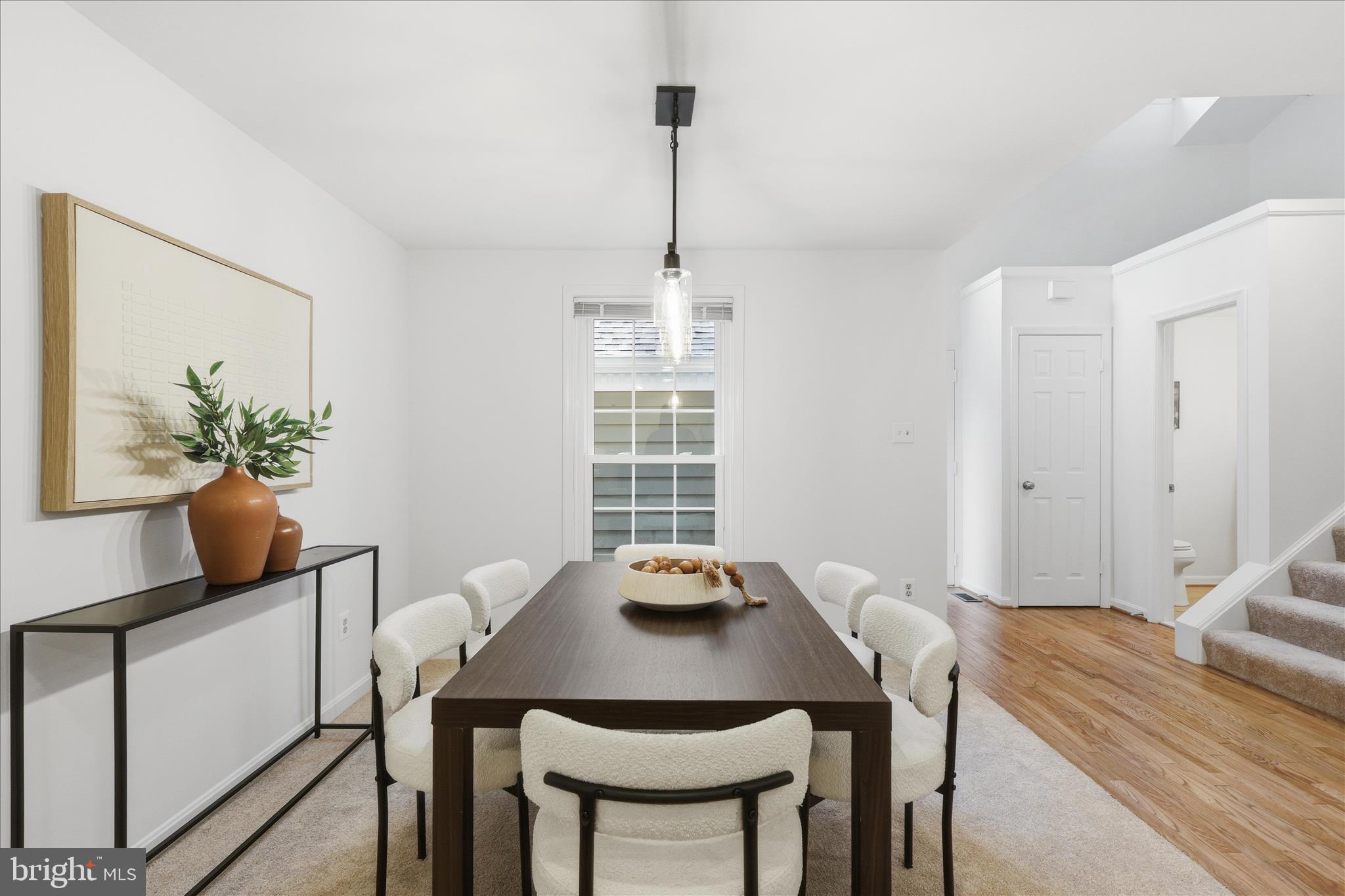 11725 Arbor Glen Way Reston, VA 20194 - Photo 9 of 63 a view of a dining room with furniture window and wooden floor