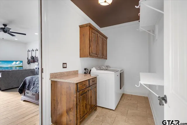 a storage room with washer and dryer