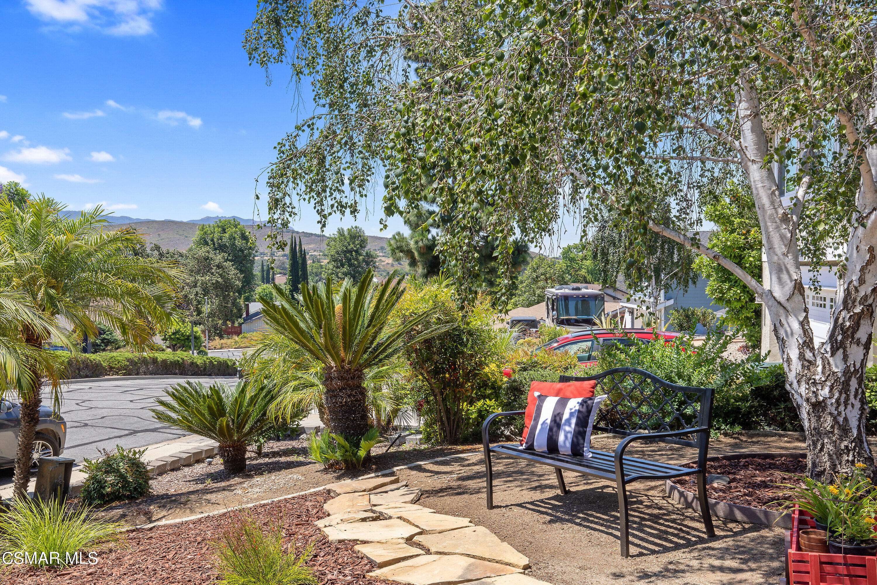 3049 Westridge Circle Thousand Oaks, CA 91360 - Photo 11 of 62 a view of a chairs and table in a backyard