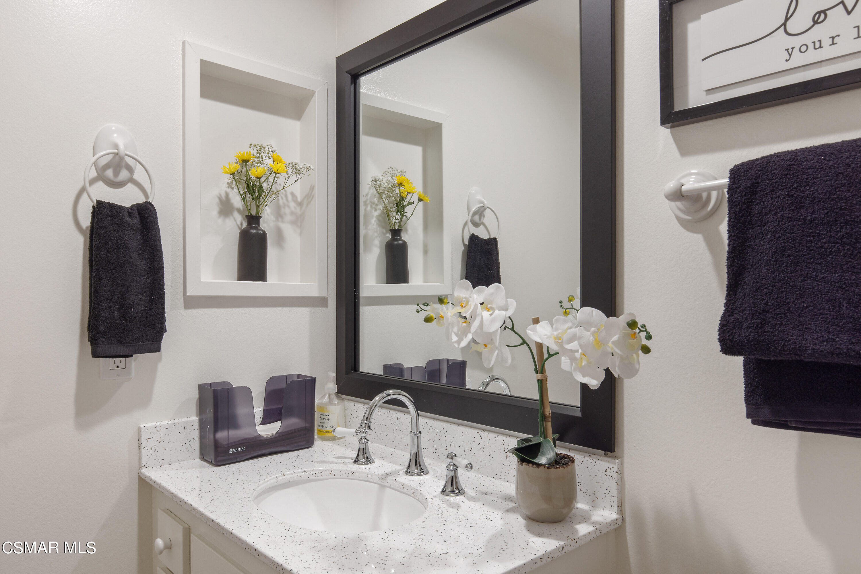 3049 Westridge Circle Thousand Oaks, CA 91360 - Photo 22 of 62 a bathroom with a sink and a mirror
