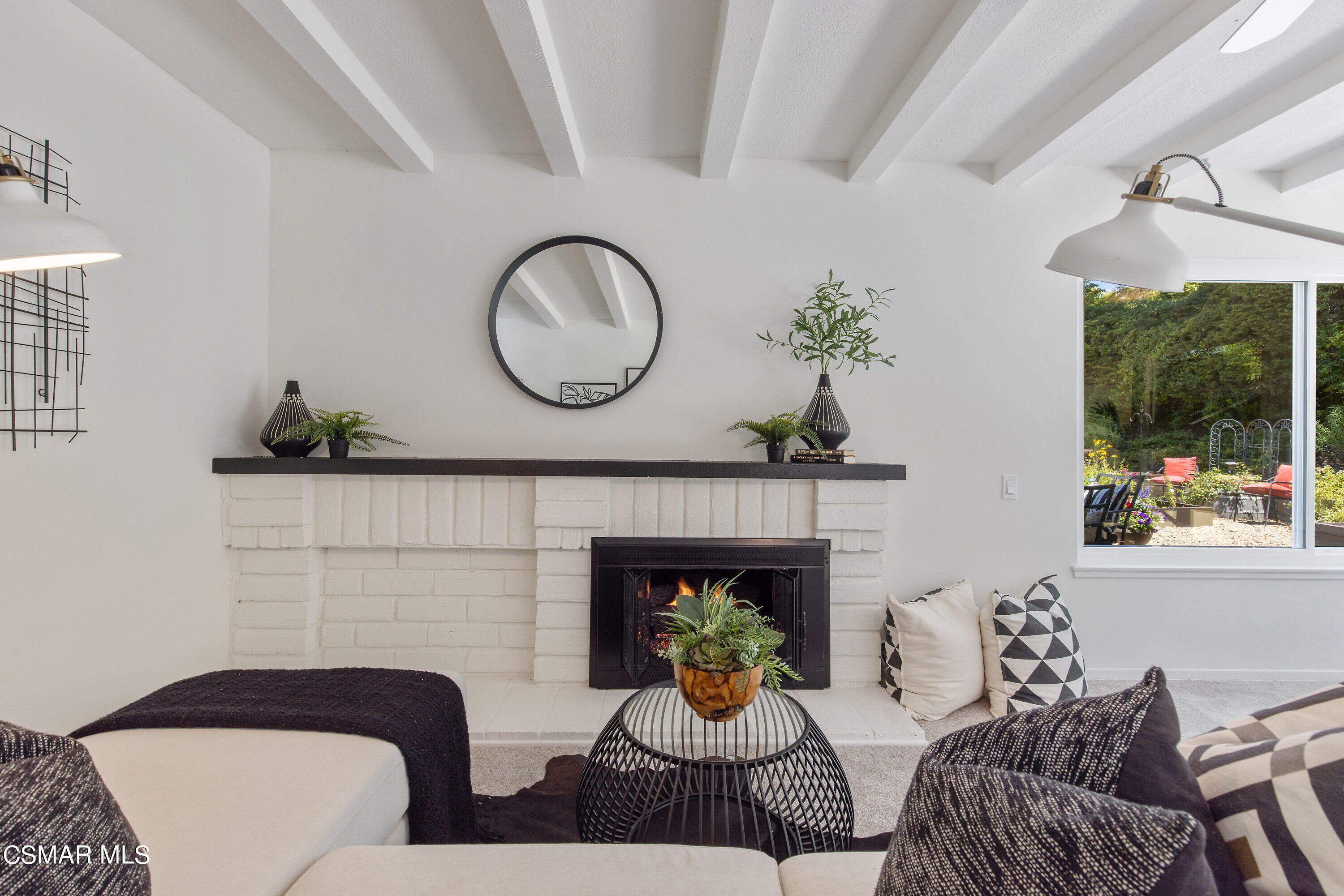 3049 Westridge Circle Thousand Oaks, CA 91360 - Photo 32 of 62 a living room with furniture a window and a fireplace