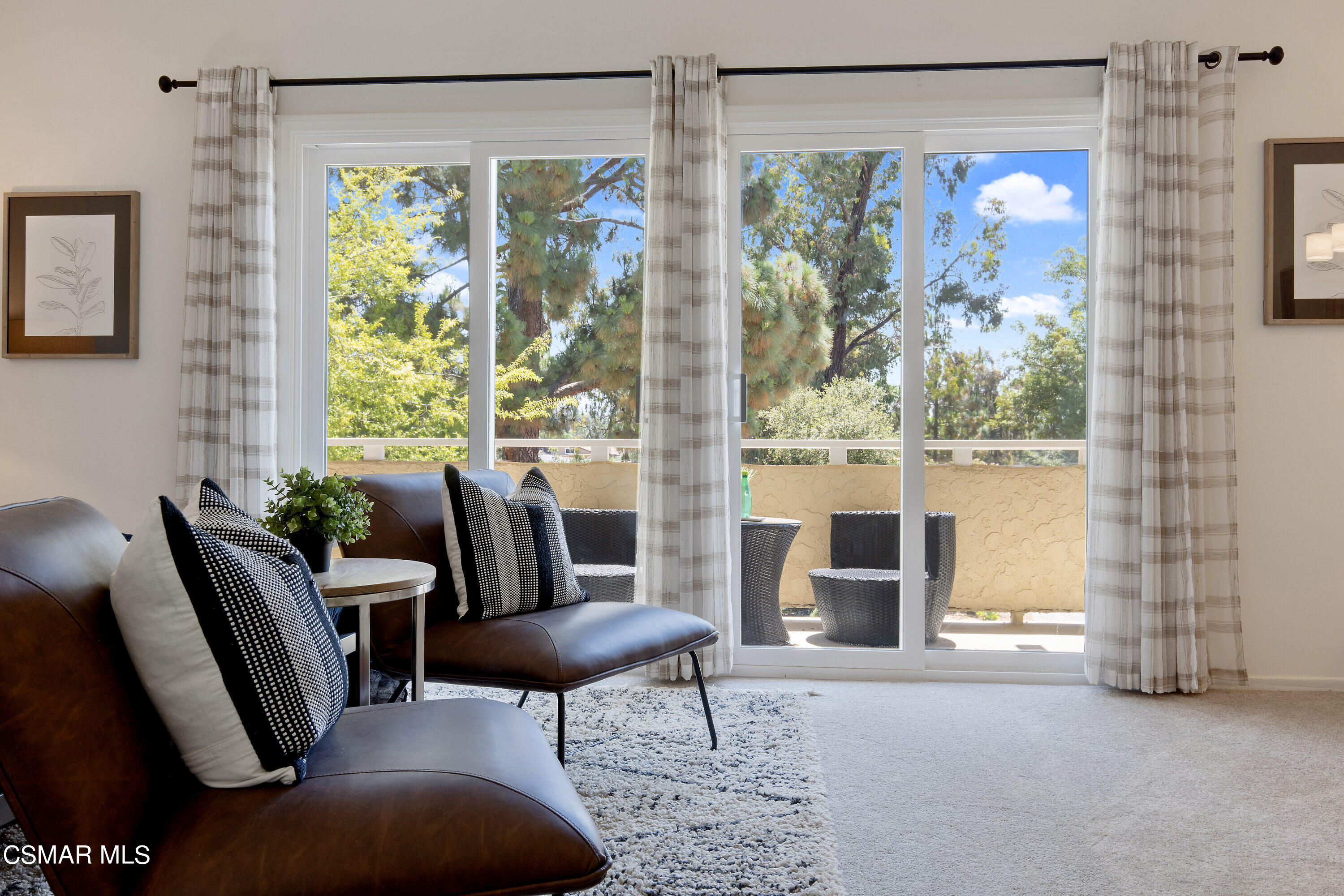 3049 Westridge Circle Thousand Oaks, CA 91360 - Photo 41 of 62 a living room with furniture and a floor to ceiling window