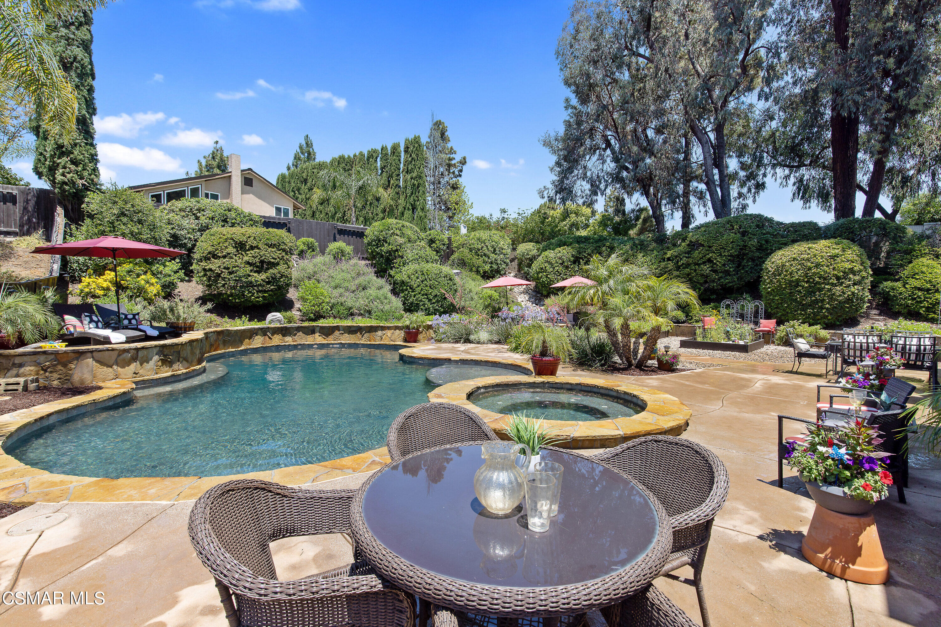 3049 Westridge Circle Thousand Oaks, CA 91360 - Photo 48 of 62 a view of a swimming pool with outdoor seating