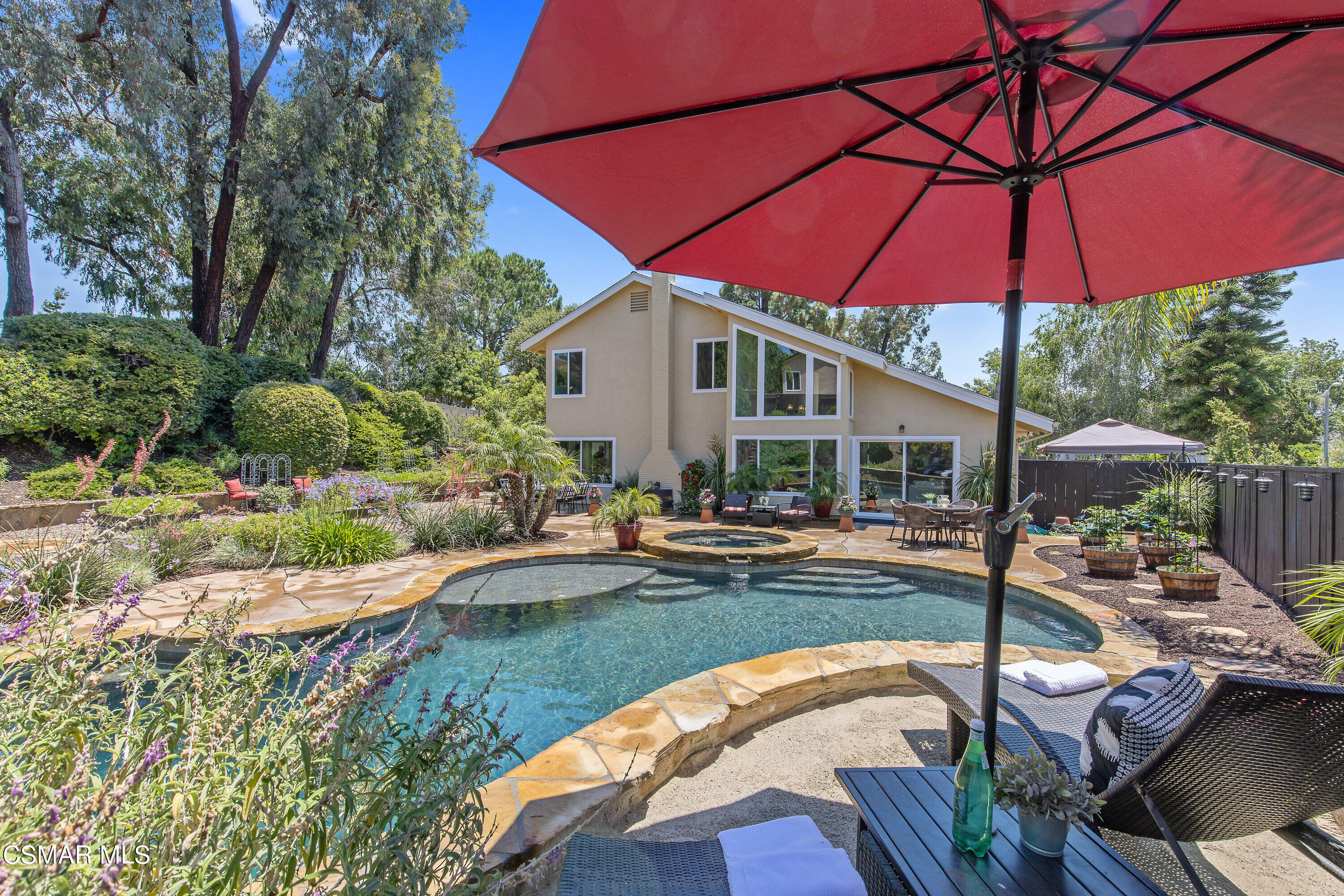 3049 Westridge Circle Thousand Oaks, CA 91360 - Photo 51 of 62 a view of a swimming pool with a patio