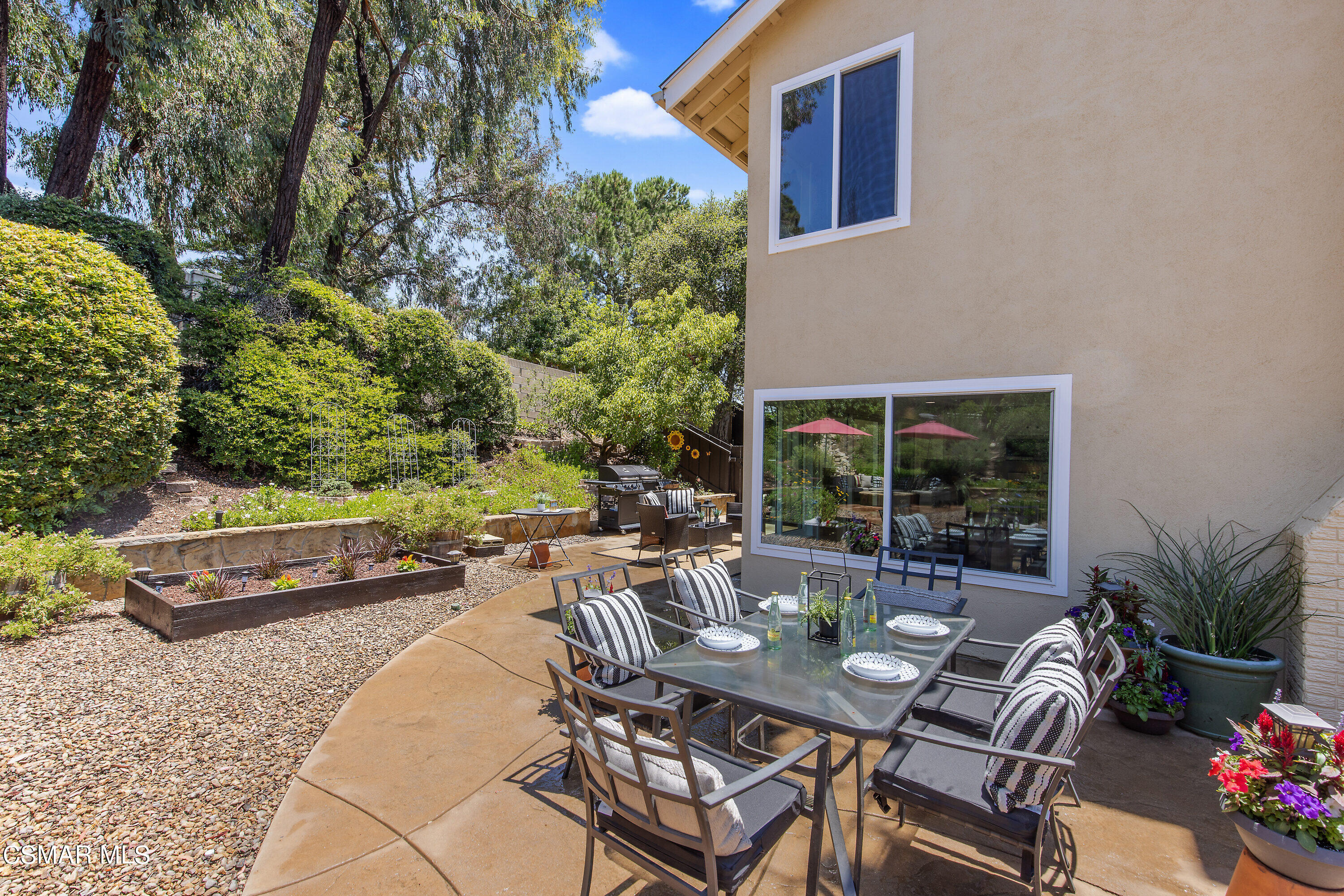 3049 Westridge Circle Thousand Oaks, CA 91360 - Photo 55 of 62 a view of a patio with couple of chairs and potted plants