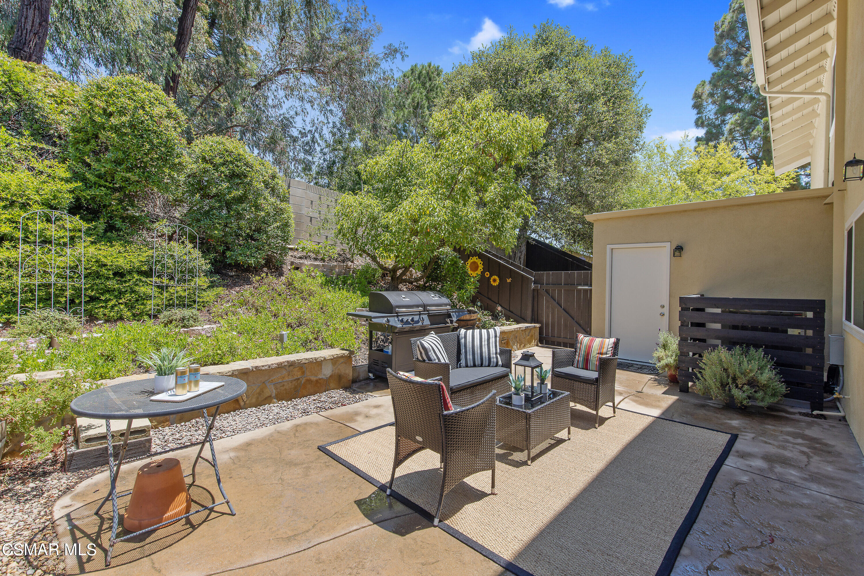 3049 Westridge Circle Thousand Oaks, CA 91360 - Photo 56 of 62 a view of a patio with table and chairs and potted plants