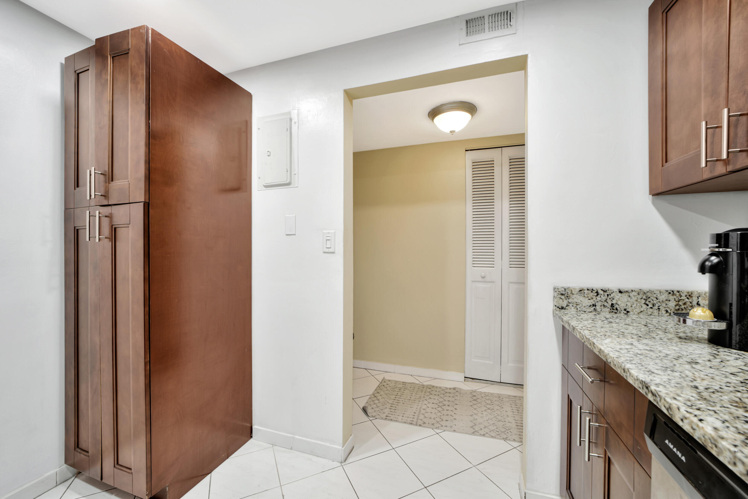 7850 West McNab Road, Unit 318 Tamarac, FL 33321 - Photo 8 of 41 Kitchen Pantry