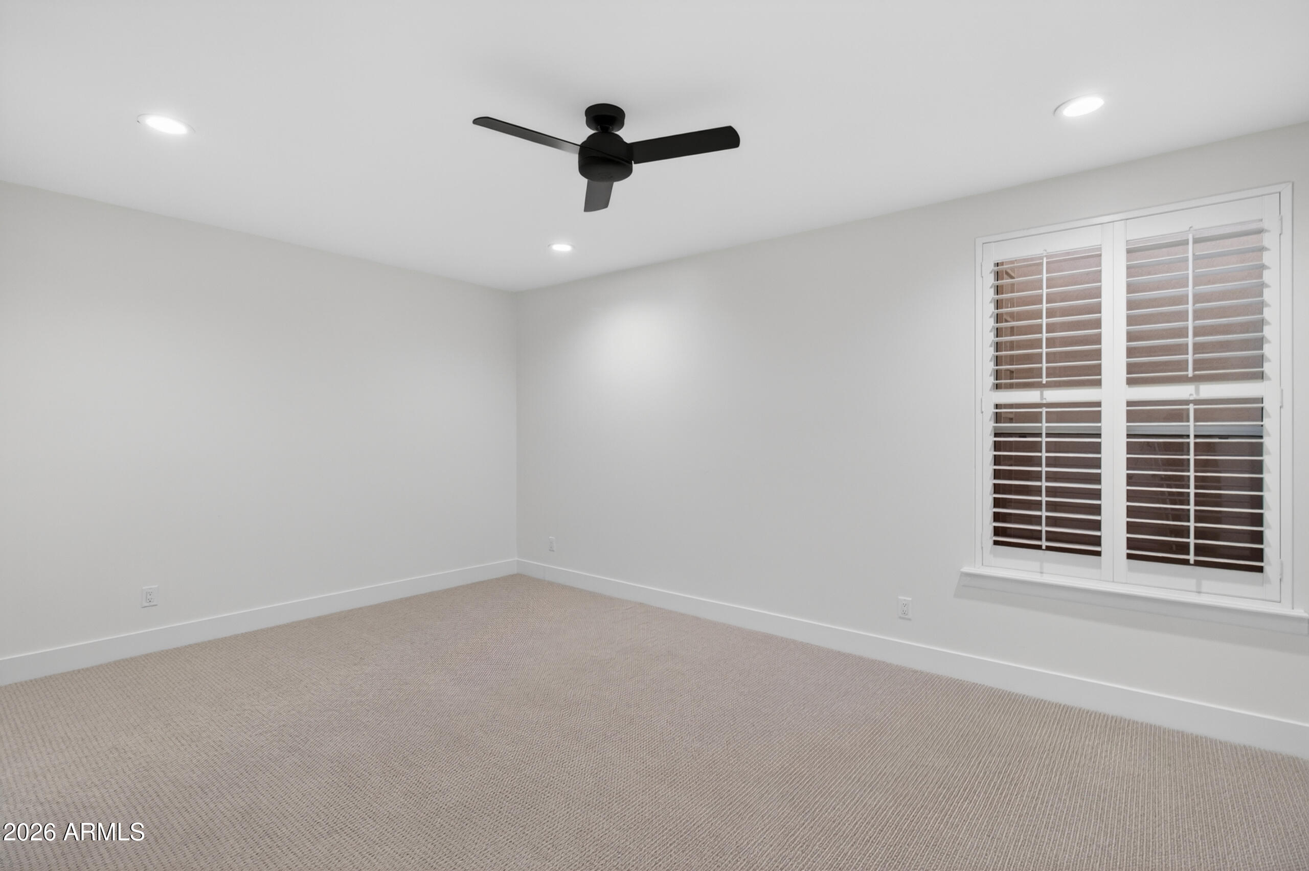 2677 East Queen Creek Road Gilbert, AZ 85297 - Photo 68 of 128 wooden floor in an empty room with a window